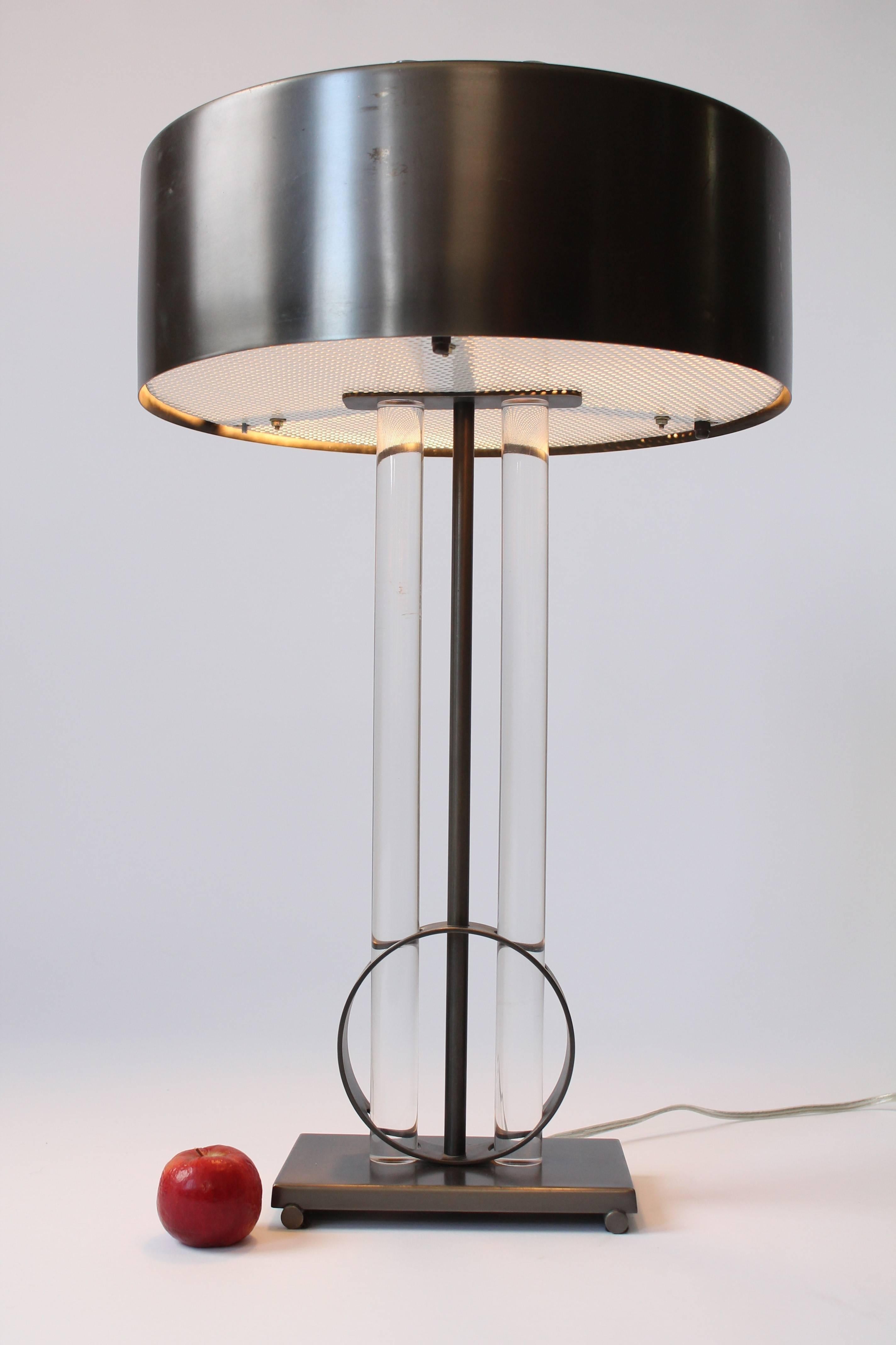 Lacquered raw steel shade and base, thick Lucite stem, fully pierced enameled metal diffuser under.

Massive in size, weight and presence. 

Extremely solid, well made construction.

Two E26 regular size socket.

Measures: 27 inches high by 15