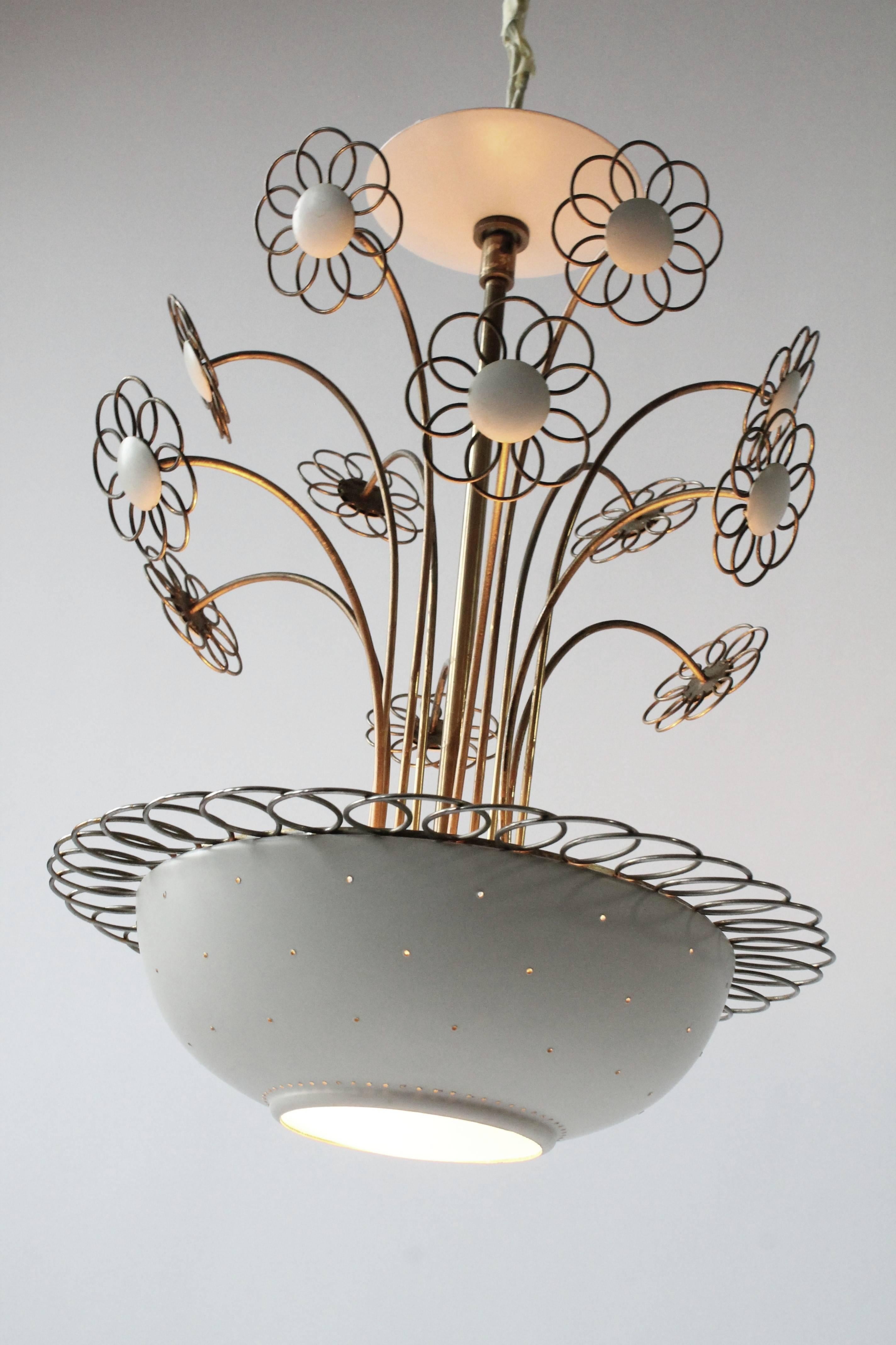 Floral bouquet and hardware are brass plated, main stem is made of brass.

The spun aluminium pierced shade is enameled in a cream white mat finish.

Glass diffuser under.

Matching original canopy.

Measure: 17 inches high by 13 inches