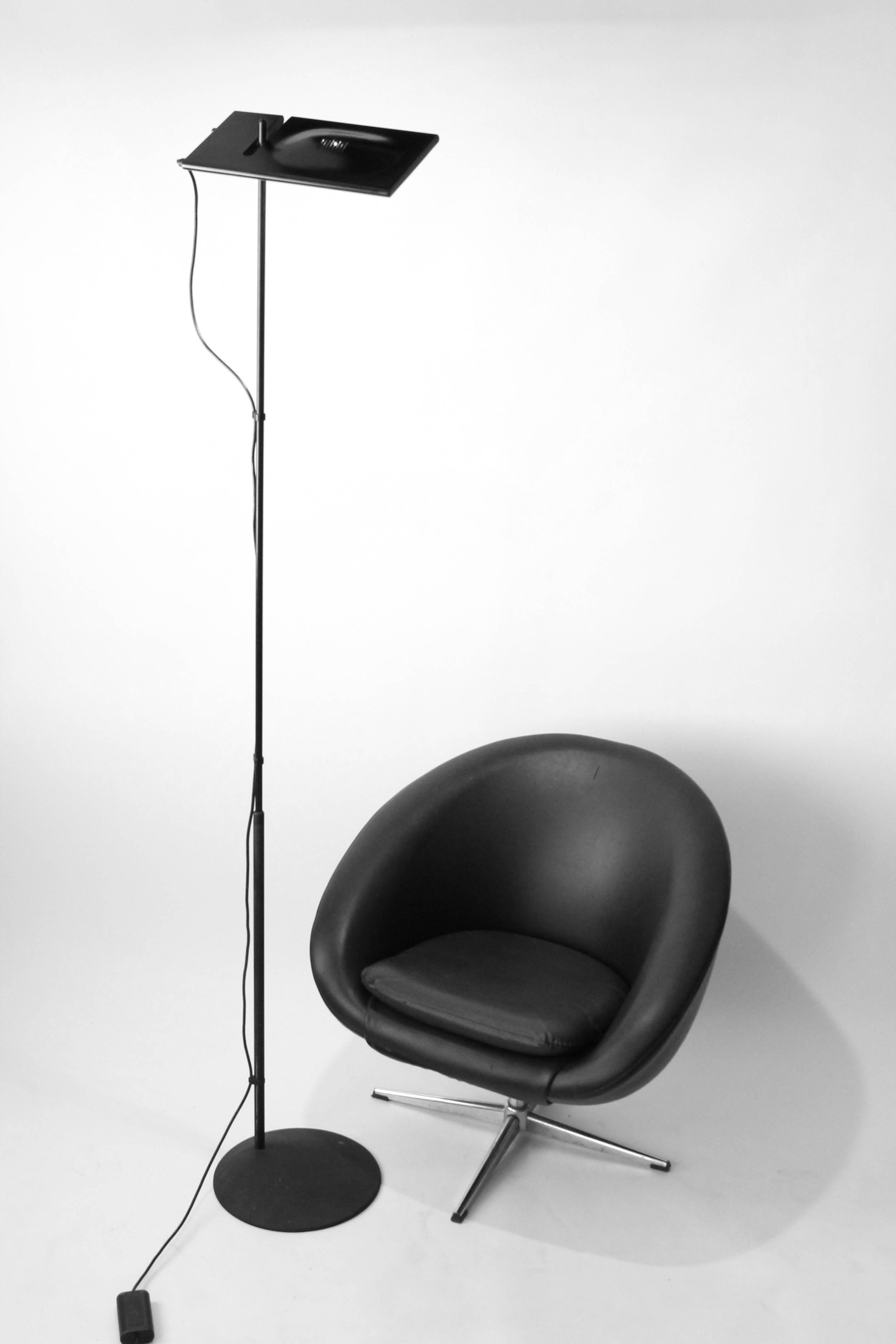 Powerfull Italian minimalist elegance.

This  Duna Terra first edition floor lamp have the rare  original  sliding dimmer on the side of the shade instead of on the cord / floor.

The casted iron conical base with signature under also differ from