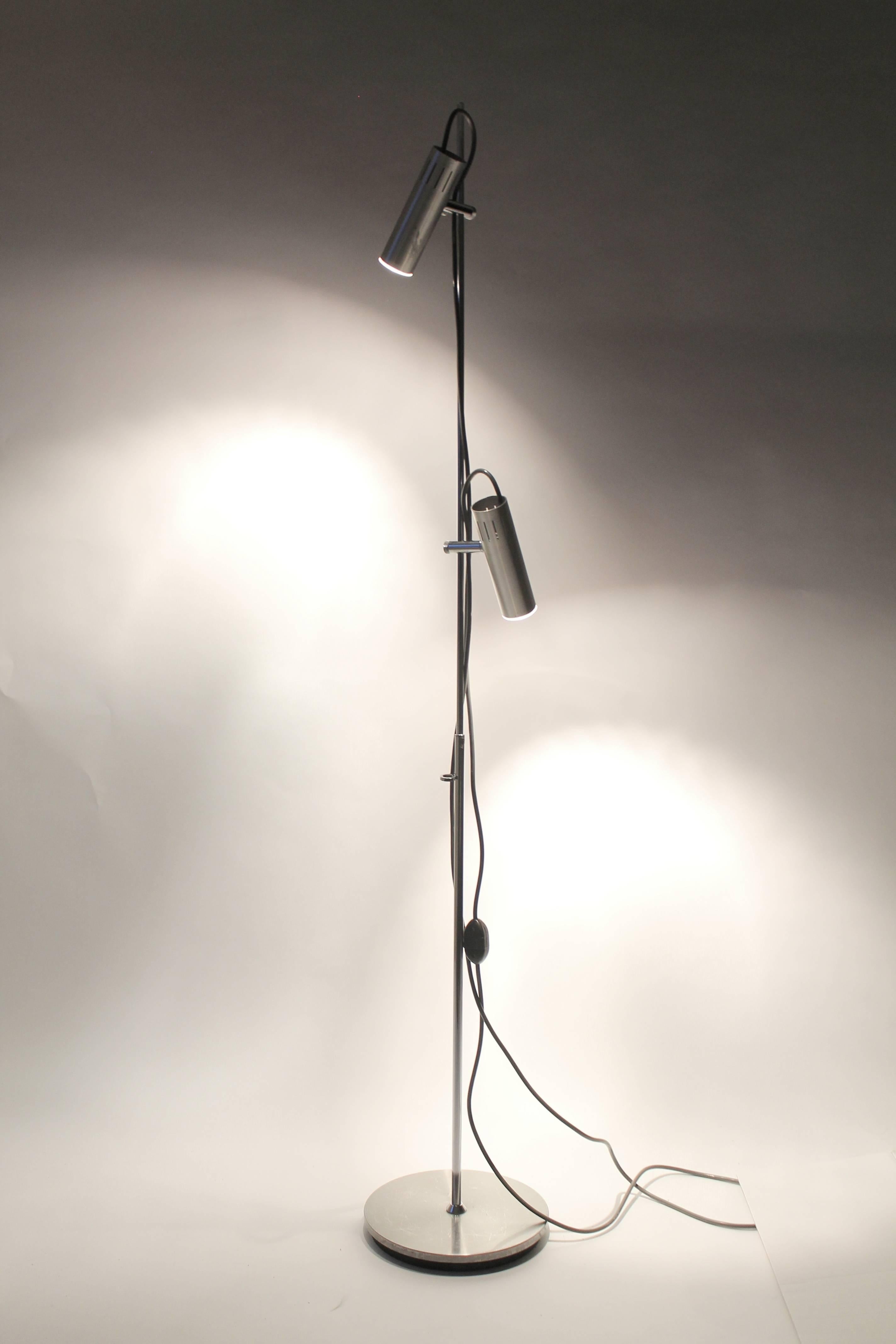 Iconic Minimalist Mid-Century floor lamp from france.

Lacquered aluminium shade that lock firmly in any selected position. They also have a unique feature, the electrical socket slide up and down inside the shade to adapt to any E26 light bulbs