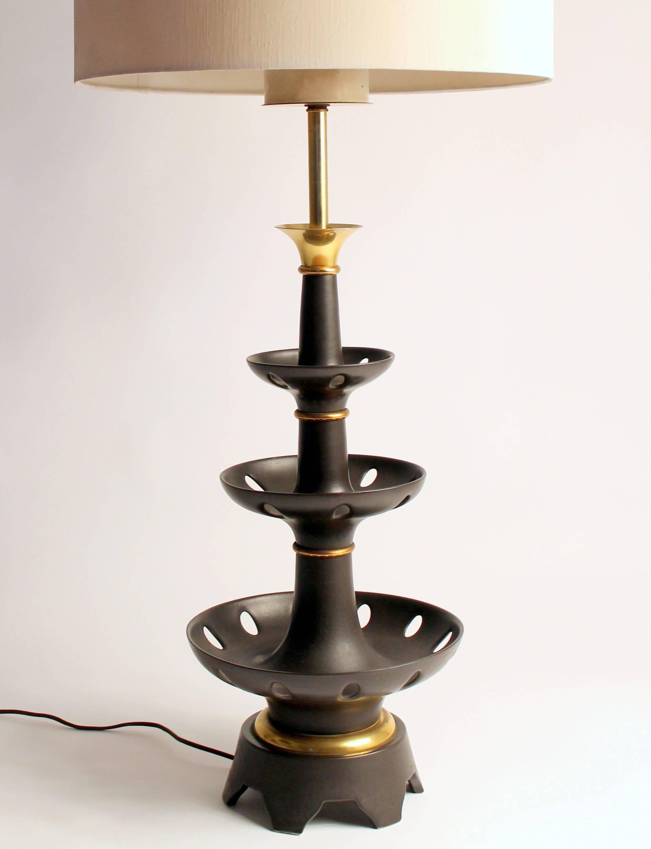 Huge in size and presence but elegant and refined with its prime quality dark brown porcelain bowl, brass hardware and accent.

Measure 41 inches high to finial tips.

Three regular E26 size socket rated at 60 watts each. 

Three-way pull