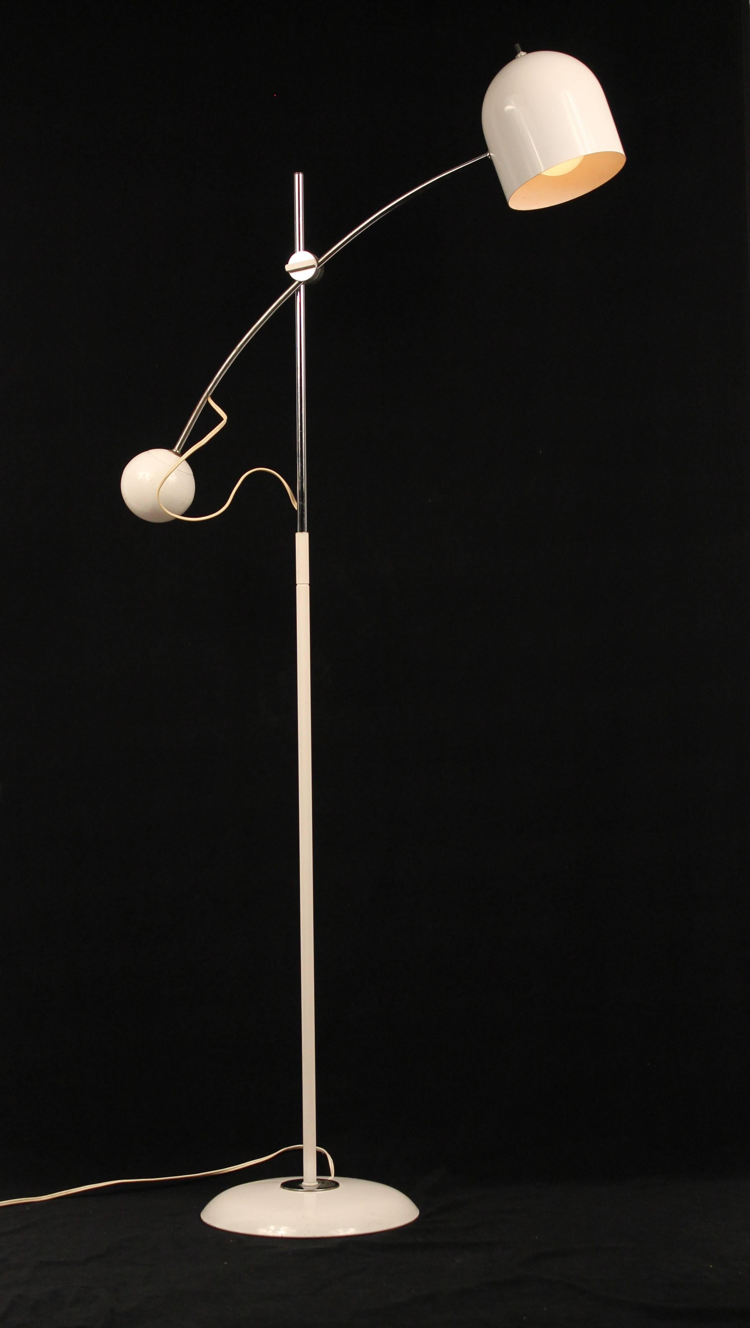 Elegant, bold, solid, well made counterweight floor lamp with an arched horizontal stem landing on a half bell shade. 

The height setting mechanism is easy to operate and very sturdy. 

Measure 58 inches high.

Bell is 6 inches wide, the ball