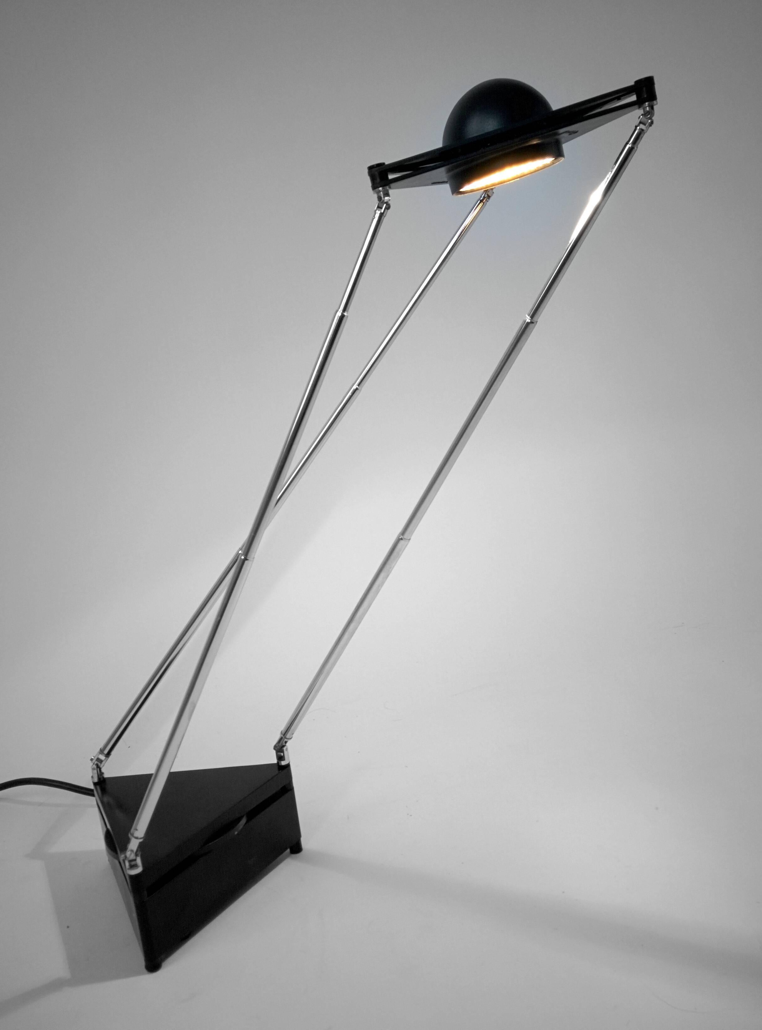 Early  edition .

Agile ,  modern , eclectic table lamp designed with car antenna  stem with chromed solid brass articulated joint on base and  head that permit to sculpt different aesthetical composition while lighting any given surface or