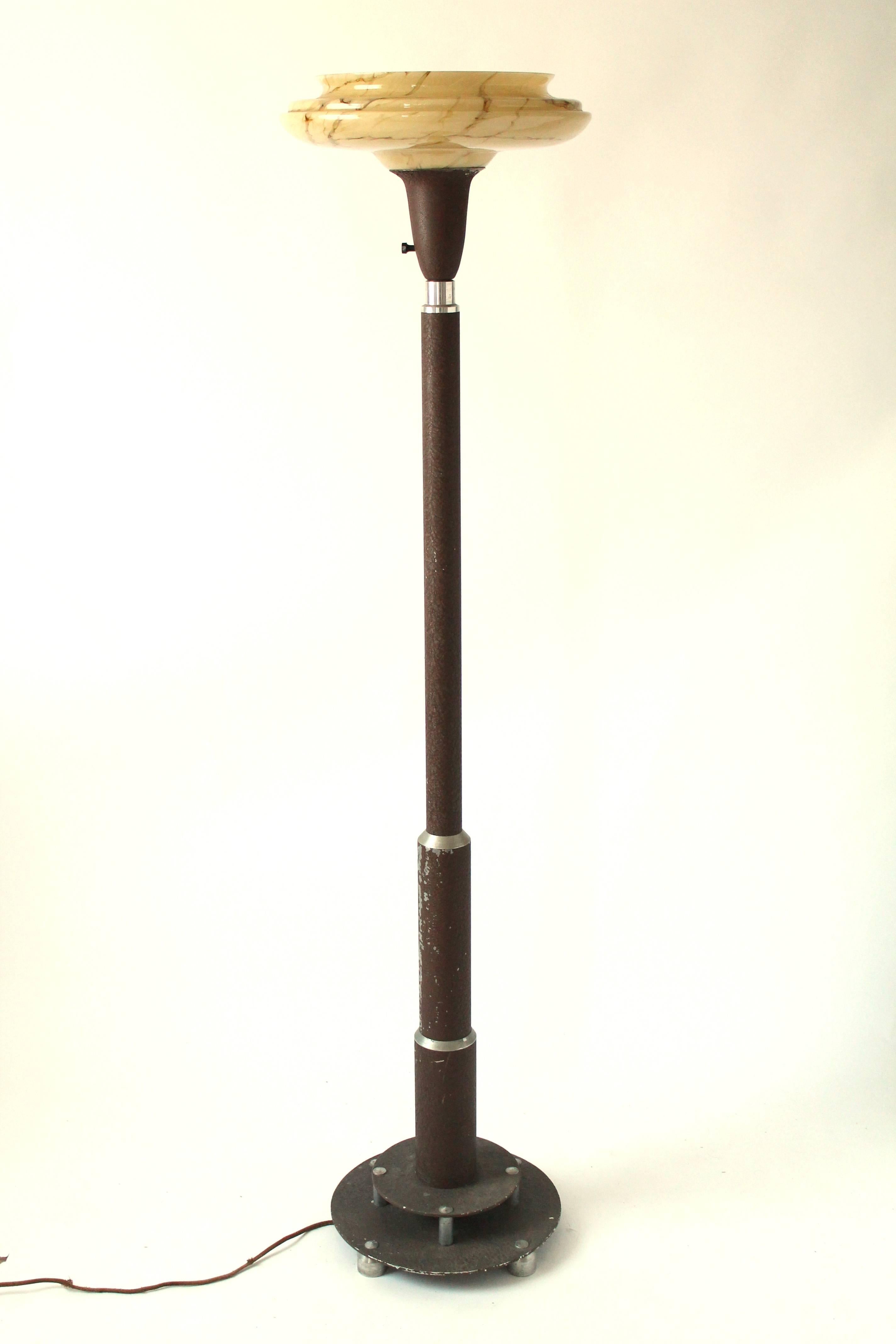Well made Machine Age floor lamp fabricated out of milled aluminium. Solid, sturdy construction. Chocolate brown wrinkle finish. Marble effect glass shade in a warm beige tone with brown streak.