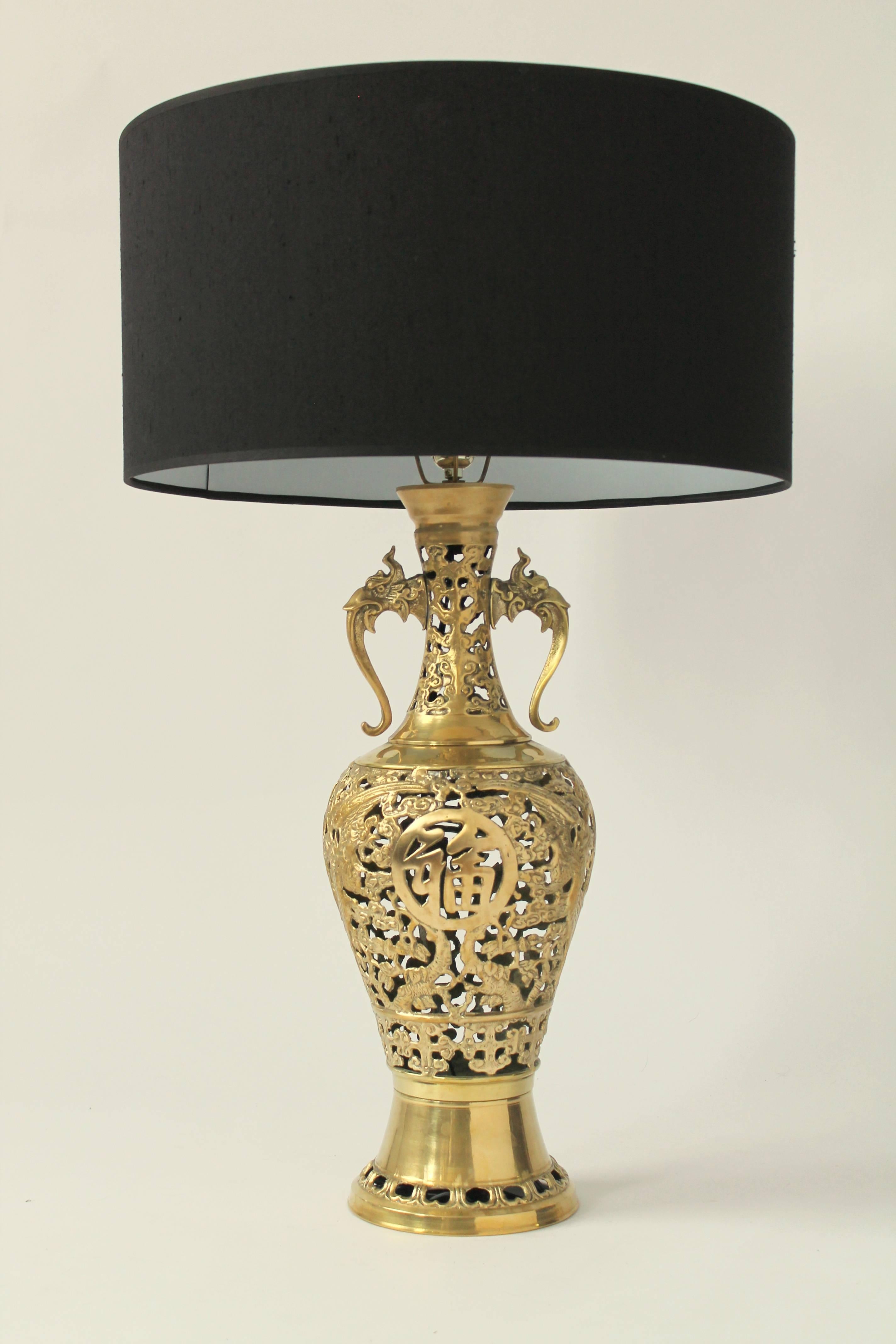 Prime quality Mid-Century brass casted with a near incised precision. 

Asian inspired motif . 

The solid part of the lamp have been milled and polished. 

Measures 34 inches high. 

Regular E26 socket rated at a 100 watts maximum. 

Original cord