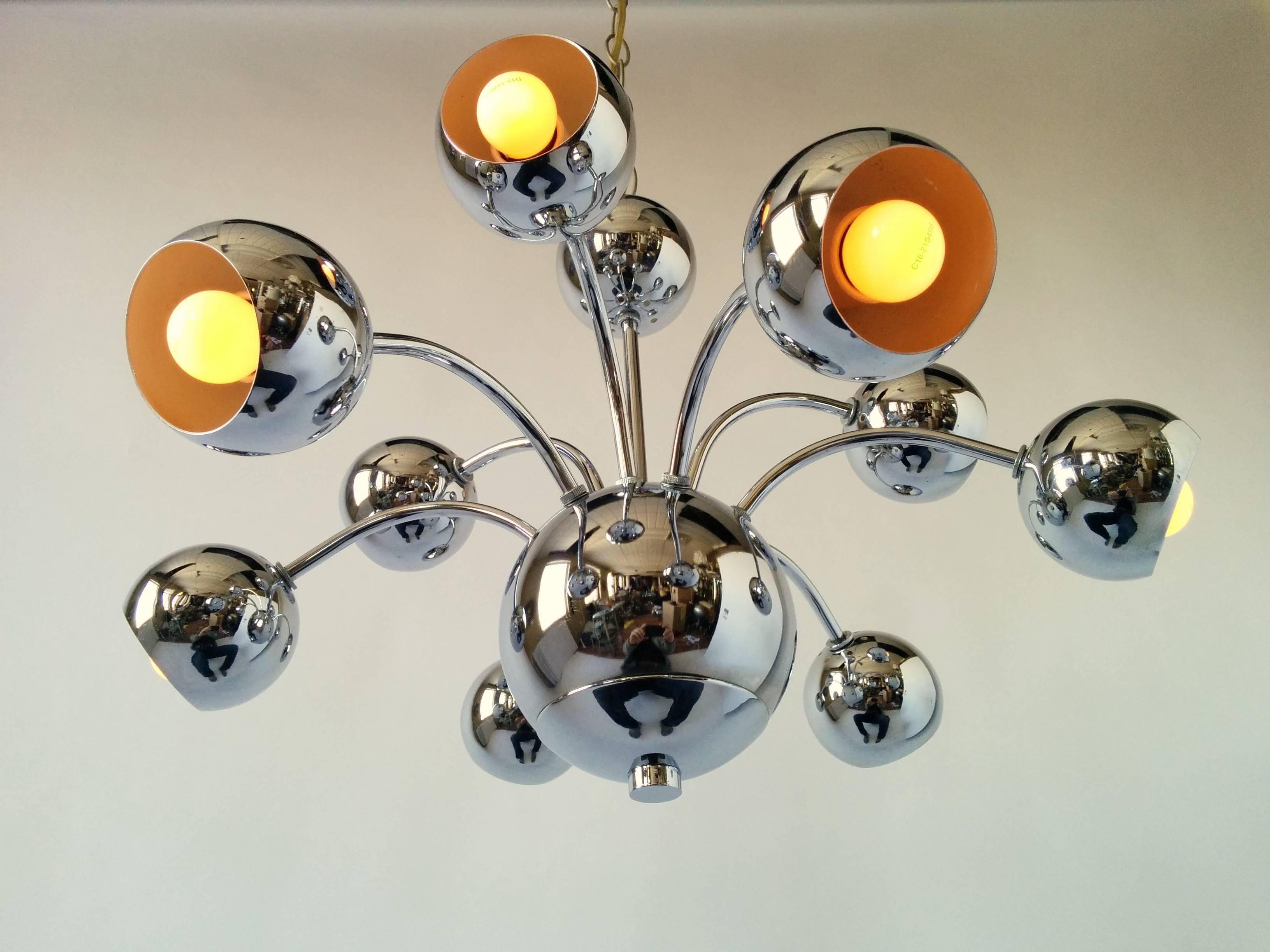 Sculptural shaped lamp with a deep 1970s chrome finish. 

Contain nine regular E26 socket.

Each eyeball measure 3.5 inches.

Look for a pair of matching table lamp in nearby listing.