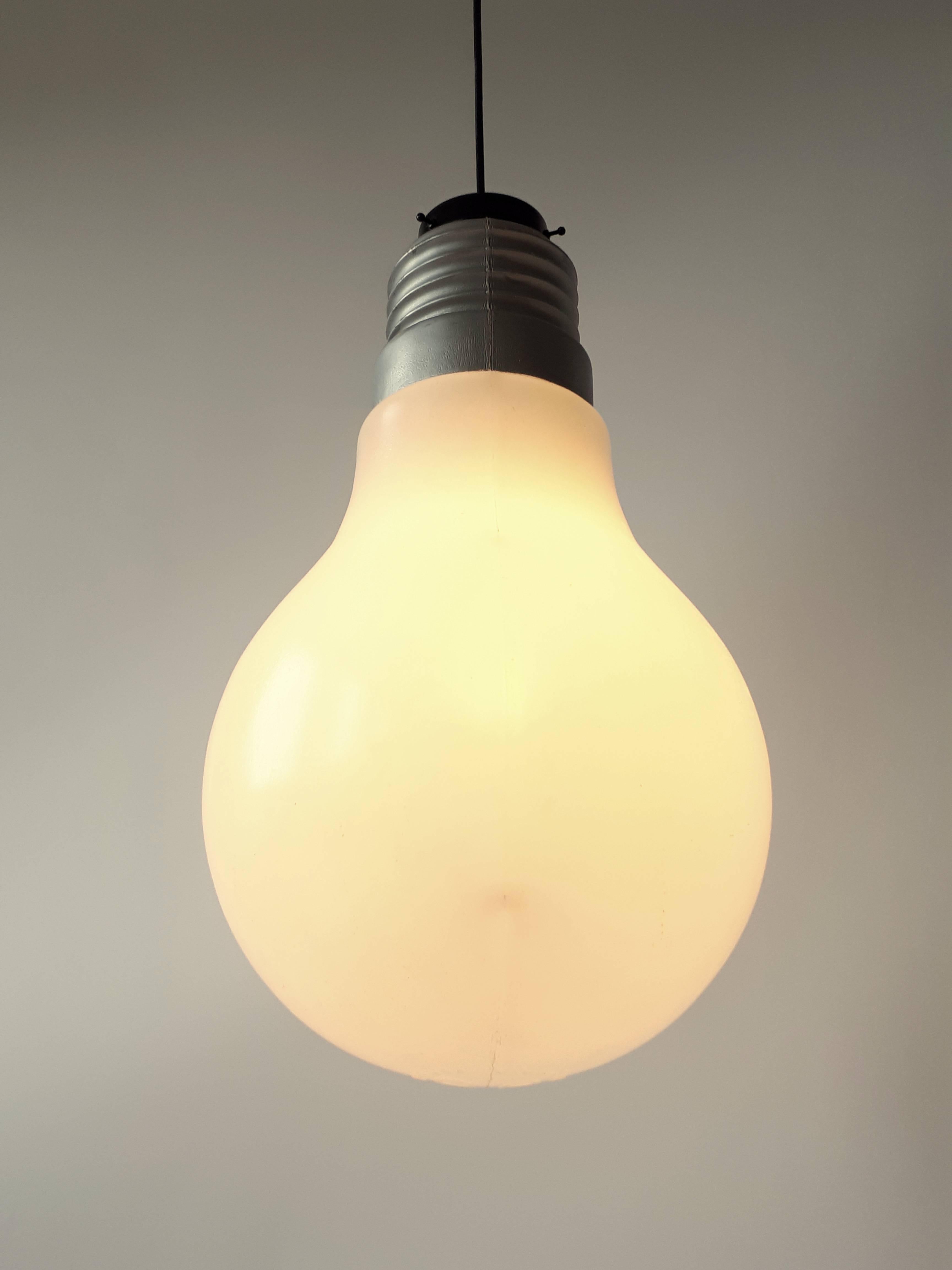 Iconic oversize 'Bulb Bulb' could be hang from the ceiling or lay loose on the floor. 

Contain one regular E26 size socket rated at 60 watts. 

Come with 12 feet long new black cord with wall plug.

Marked item. 

