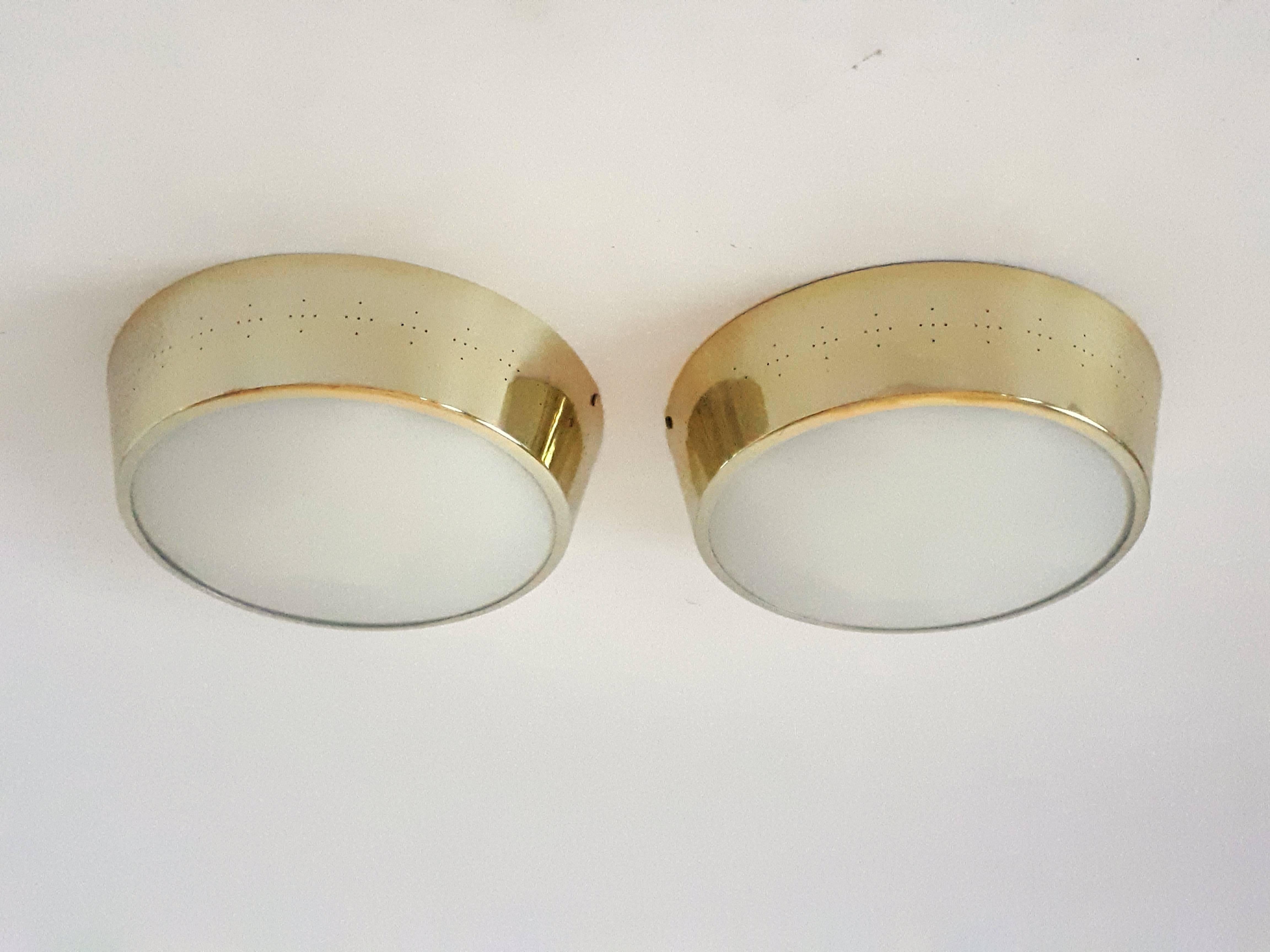 Pierced brass-plated frame with convex opale glass . 

Contain ( 3 ) three E26 regular size socket rated at 60 watt each. 

Measure 14 inches wide by 4 inches high.

2 available . Could sell per unit . 