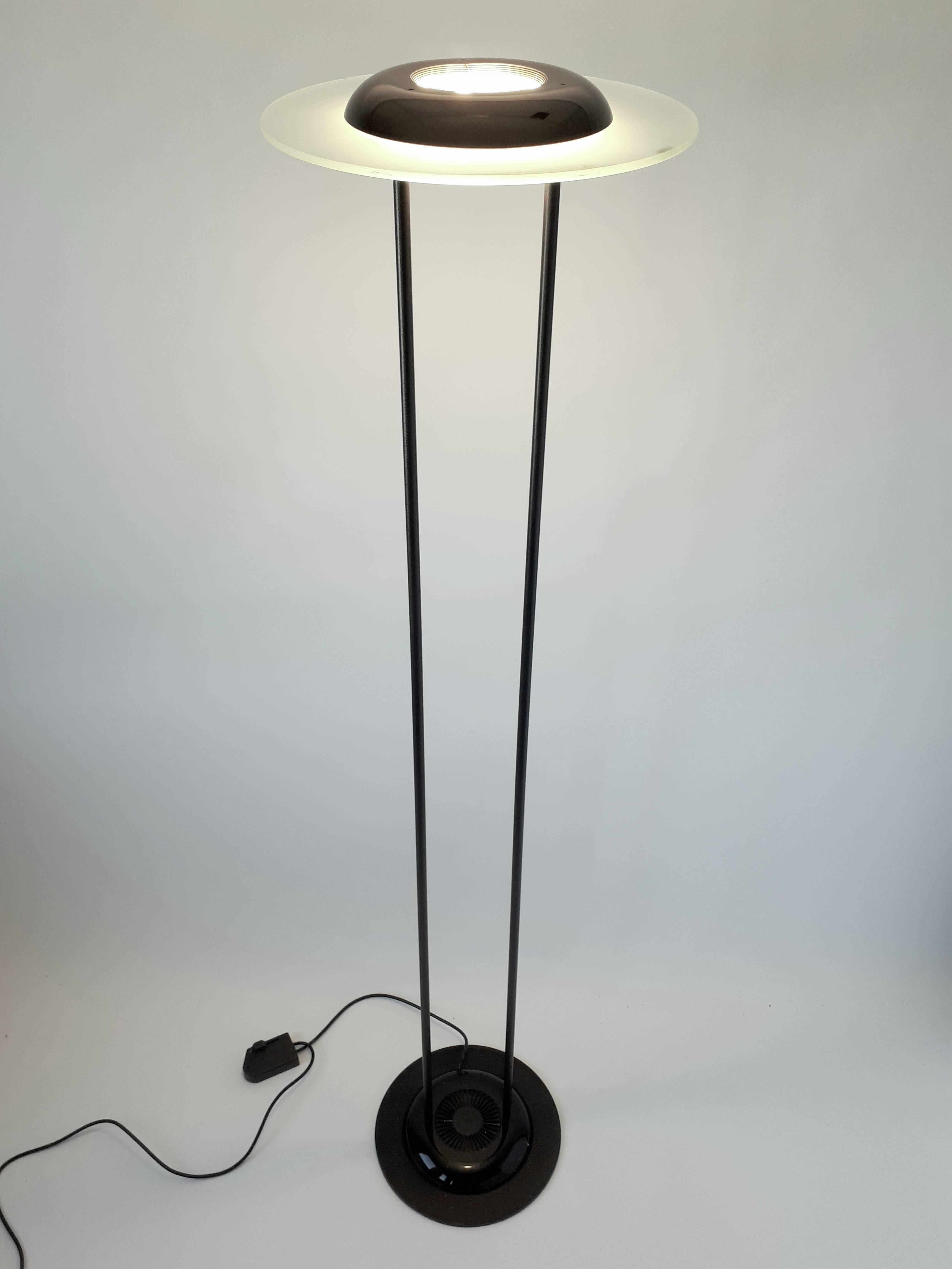 Pair of powerful halogen floor lamp made by F. Fabian, Italy

Sculptural glass shade, thick steel stem, heavy metal base.

Well made with prime quality material. 

Measure 75.5 inches high. 

Weight 35 pounds. 

Regular T3 halogen light bulb rated