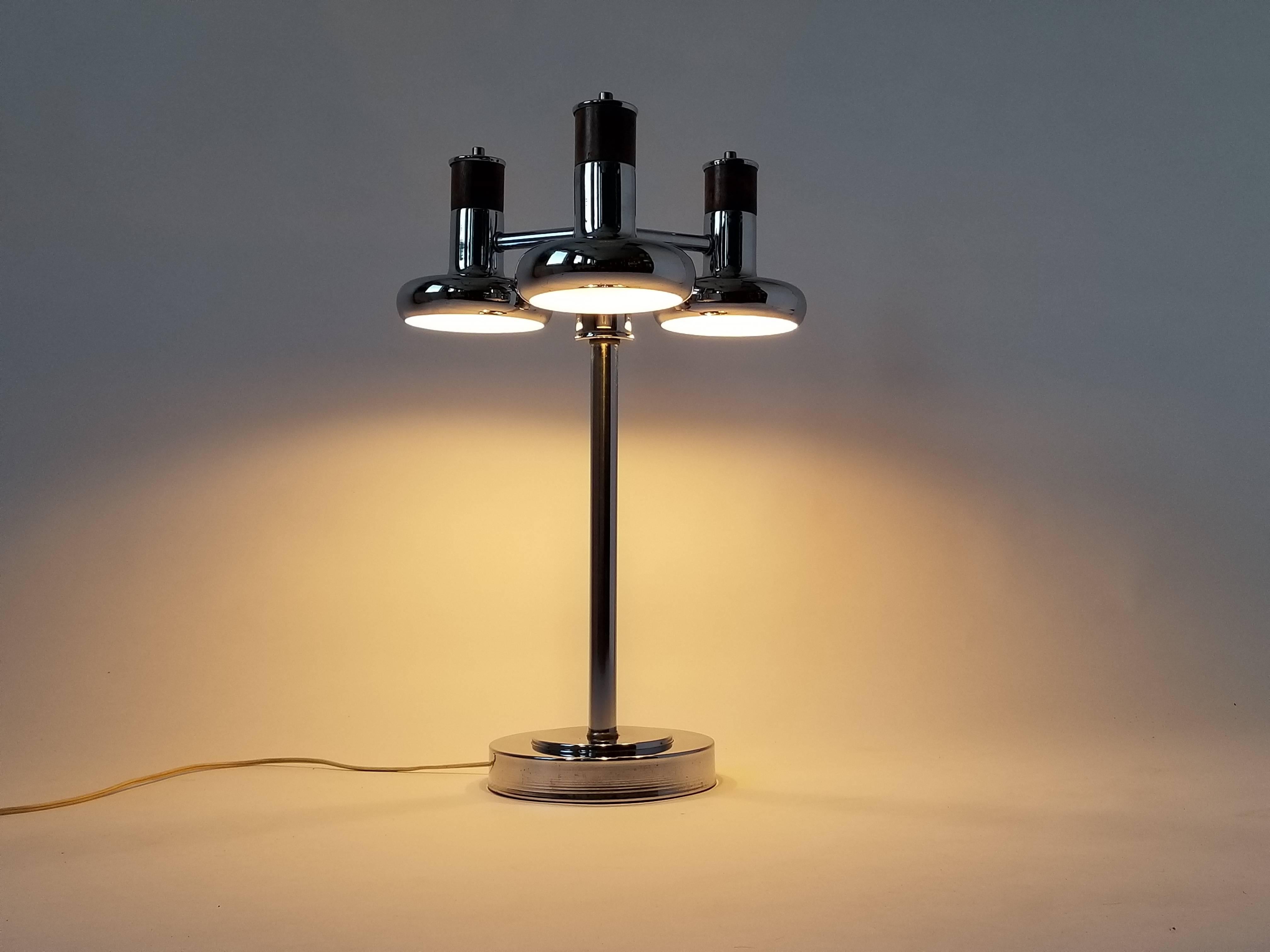 Nicely designed, solid and well made table lamp. 

In the manners of Fog & Mørup with their Optima series.

Rotating switch on pole . 

Shade measure 6 x 6 inches. 

Contain three regular E26 size socket. 

 

 