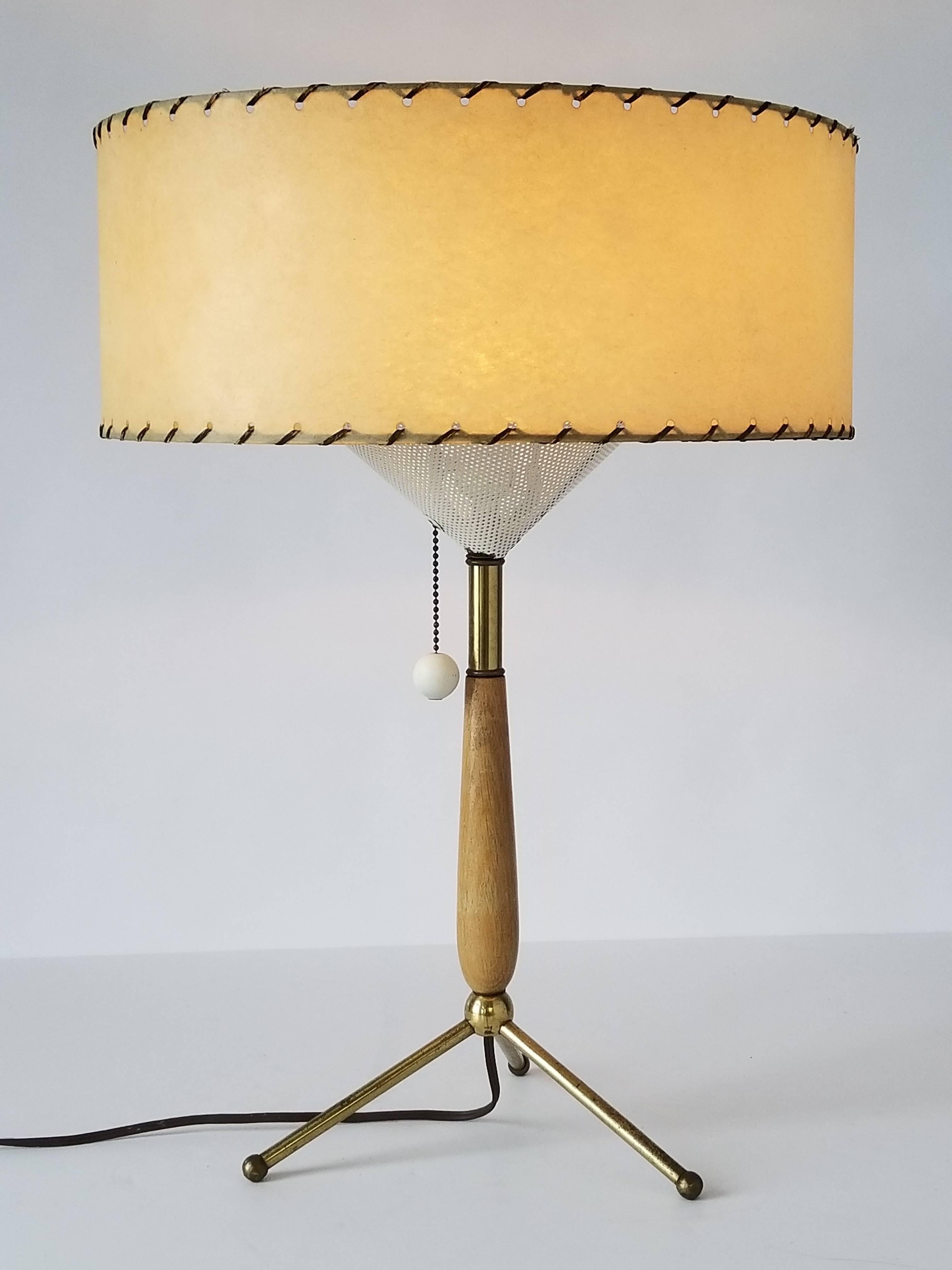 Brass, lacquered white birch, enameled pierced metal diffuser under and on top.

Fiberglass shade comes with order.

Contain one regular E26 size light bulb rated at 60 watt.

On/off pull chain .