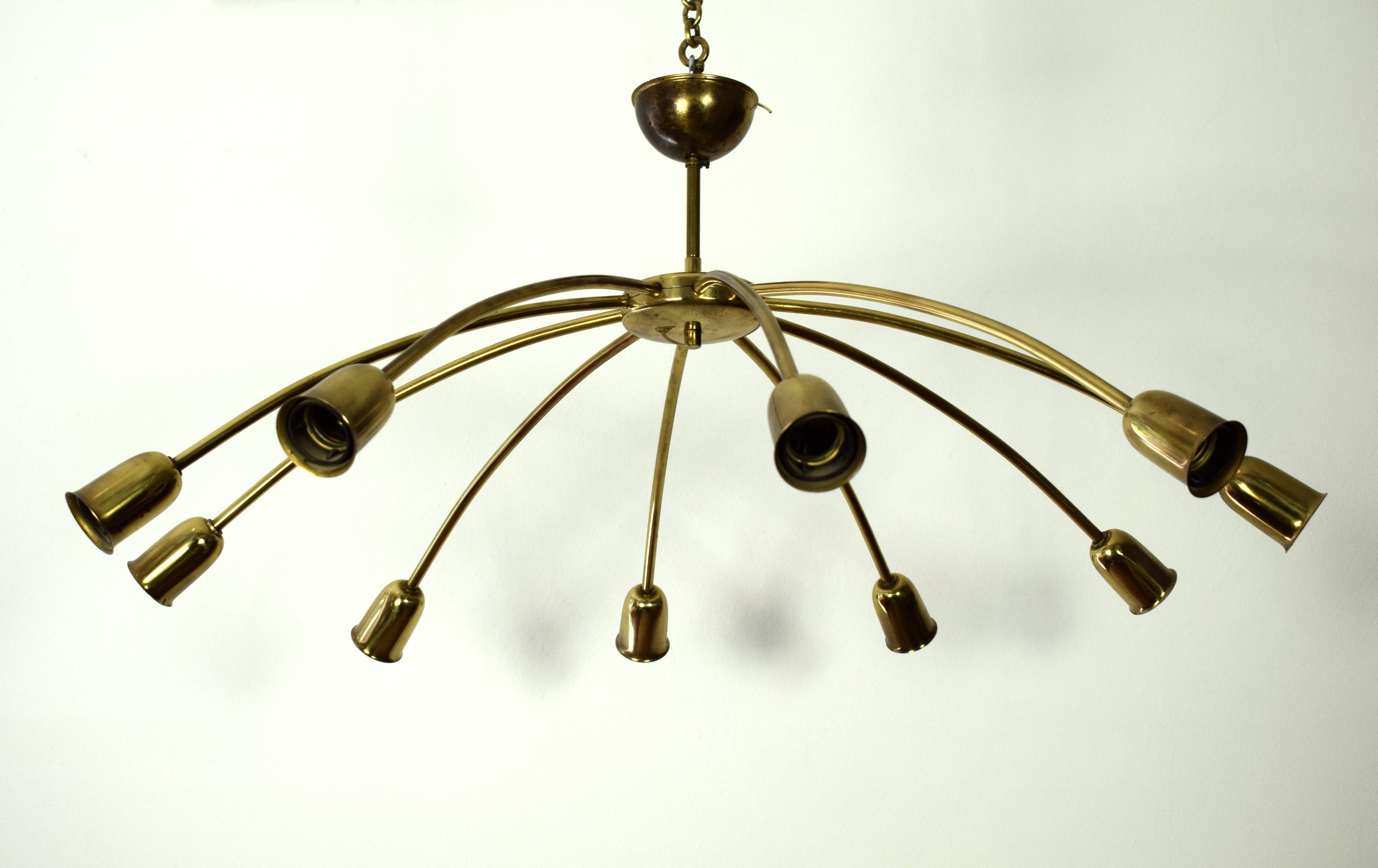 Ten curved brass arms with ten sockets features this huge spider ceiling lamp, designed and executed by J. T. Kalmar, Vienna, 1950s.

Lit.: Kalmar Katalog, 60, Model Nr. 5125, W DL 4.