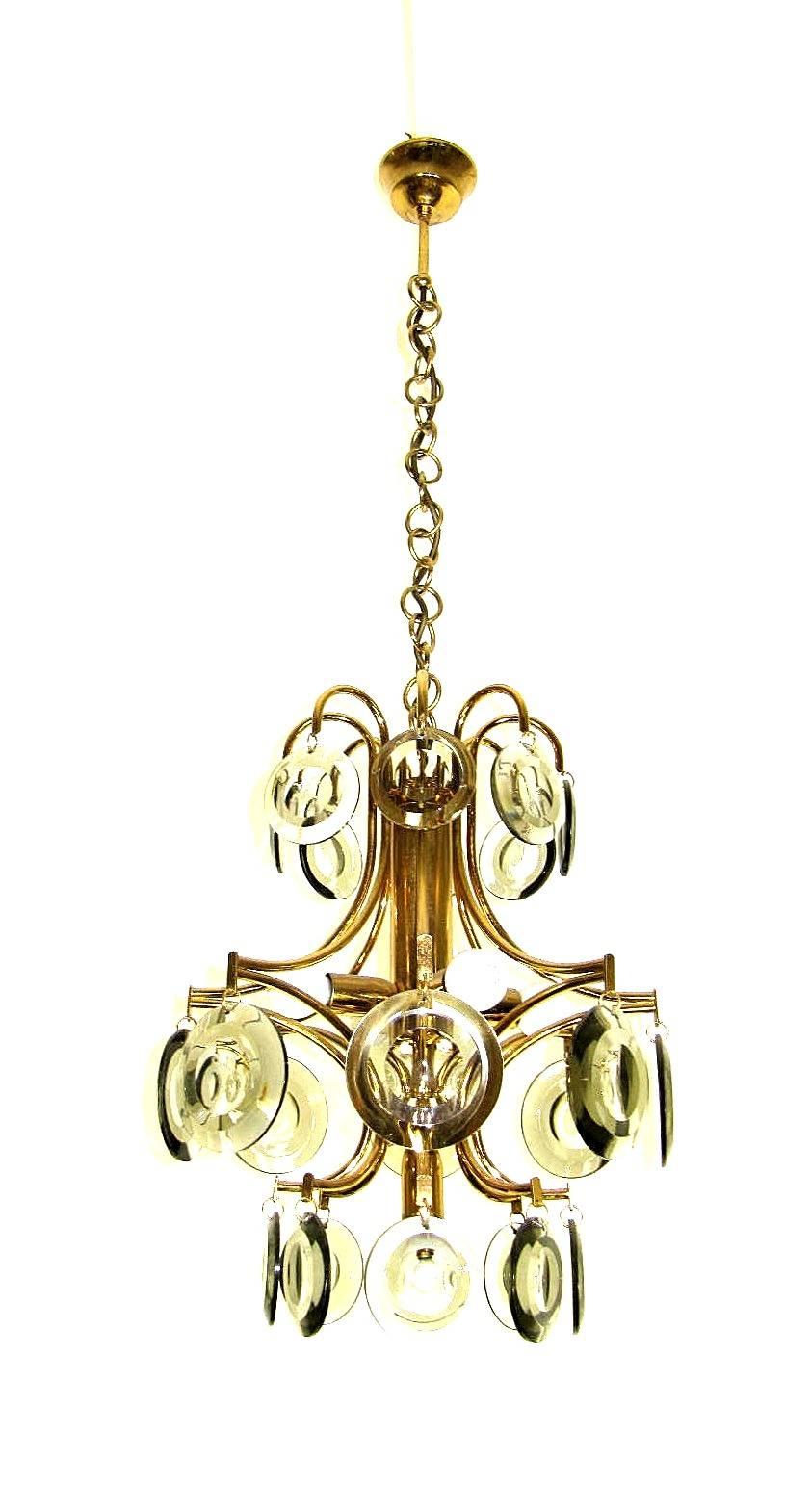 Five bulbs, ceiling lamp in Italian design. Brass and 24 polished slices of smoked glass. Very good condition.
Measures: Height 100 cm.