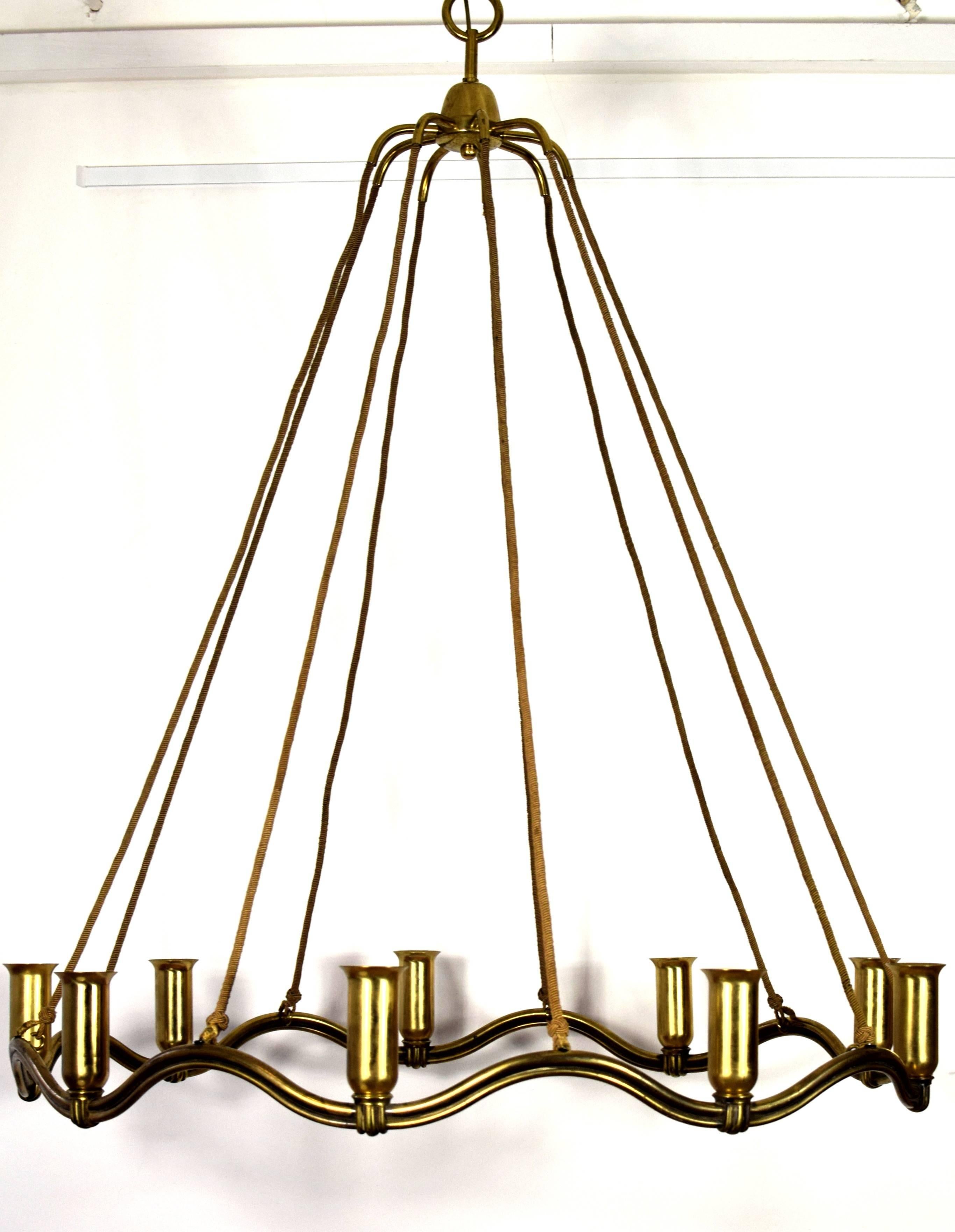 Huge museal wavy ceiling lamp made of solid brass with nine light bulbs
Design and execution of the lamps attributed by Hugo Gorge.
Creation time, circa 1935
Good original condition with nice patina
Fully functional.
According to previous