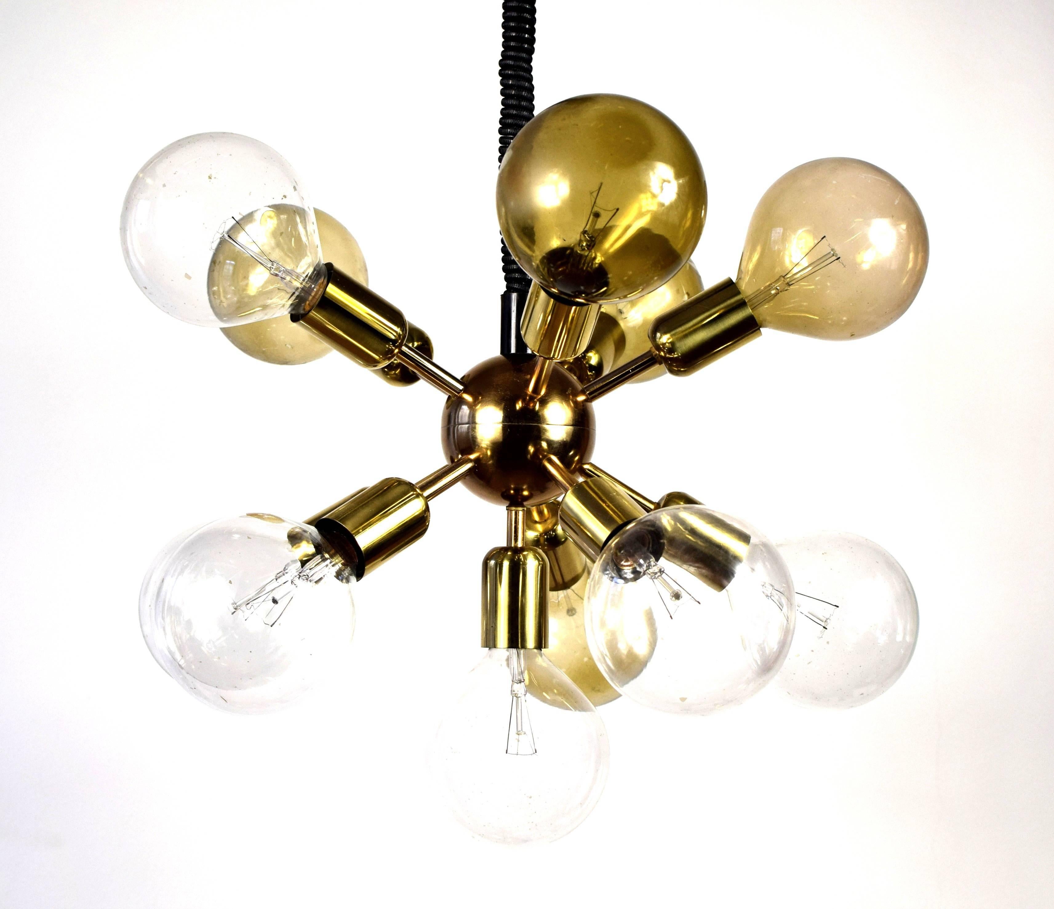 Very high quality chandelier. Material: gold-plated brass. 11 Globe bulbs with 125 mm diameter (not included in offer). 
Adjustable height (circa 80-130 cm)
Excellent condition.

Diameter: 60 cm (incl. bulbs)

I can also offer suitable bulbs