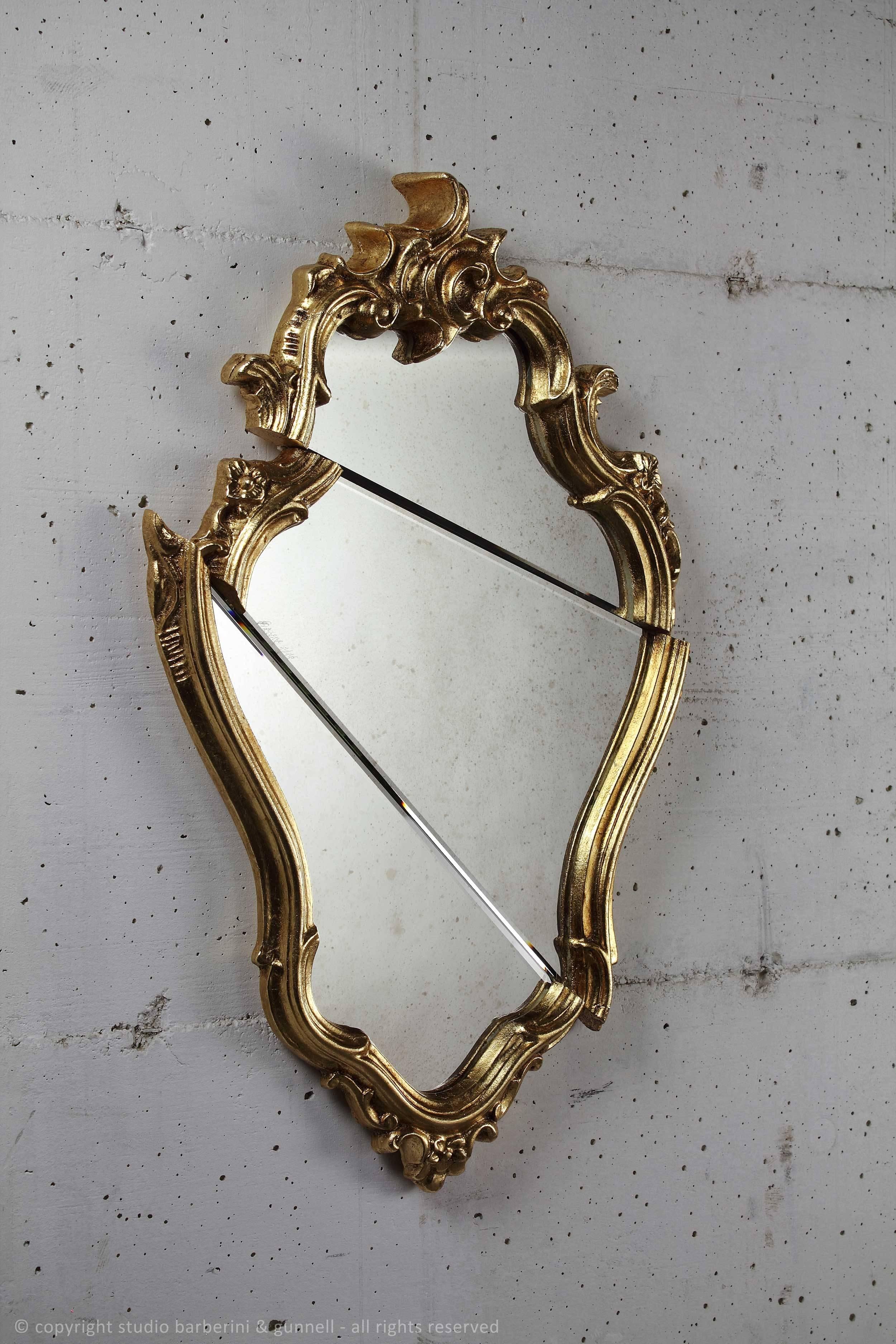 Rococut 'Barone'. Series of mirrors called 'Rococut' made up of four different mirrors. Each mirror has its own aristocratic name and comes in a limited edition of 15. 
The Rococut mirror has frame in gold-plated wood and an antiquate mirror (origin