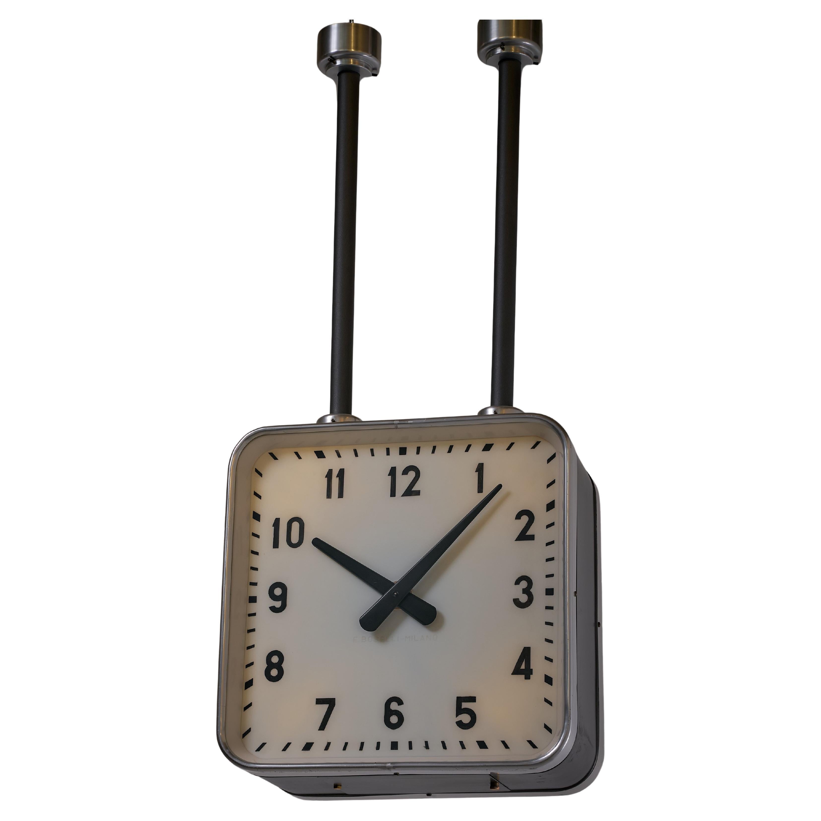 Double faced ceiling clock designed by Gio Ponti for Enrico Boselli circa 1940. Fully restored ad serviced. Literature: U. La Pietra, Gio Ponti. L'arte si innamora dell'industria, Rizzoli, 2009, p. 90, ill. 212.