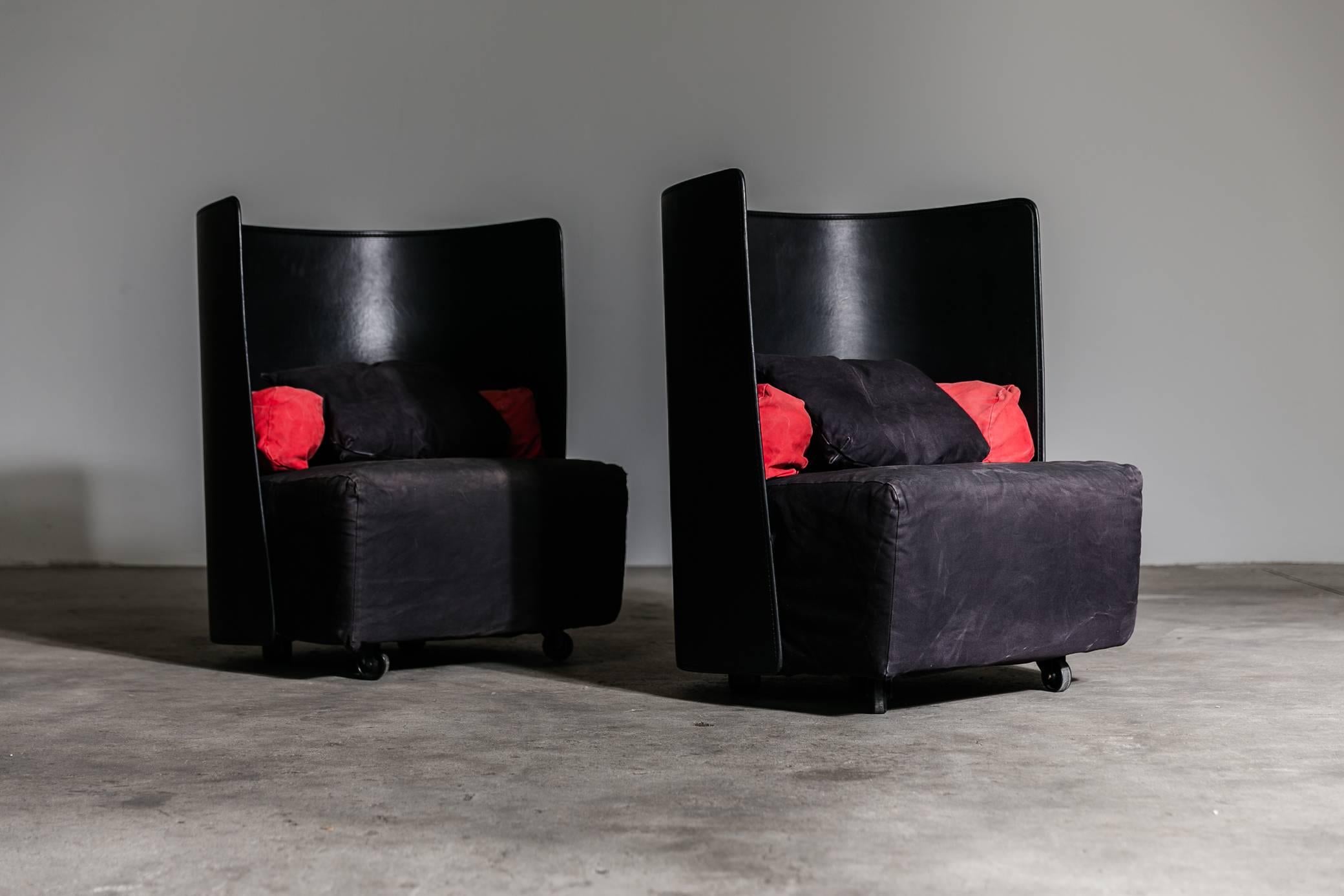 Pair of Campo armchairs by Jonathan de Pas, Donatto D'Urbino and Paolo Lomazzi for Zanotta in 1984, The circular backrest is made of leather, and makes you feel like a cocoon, a circular red cushion helps you to hold the lumbar and a small black