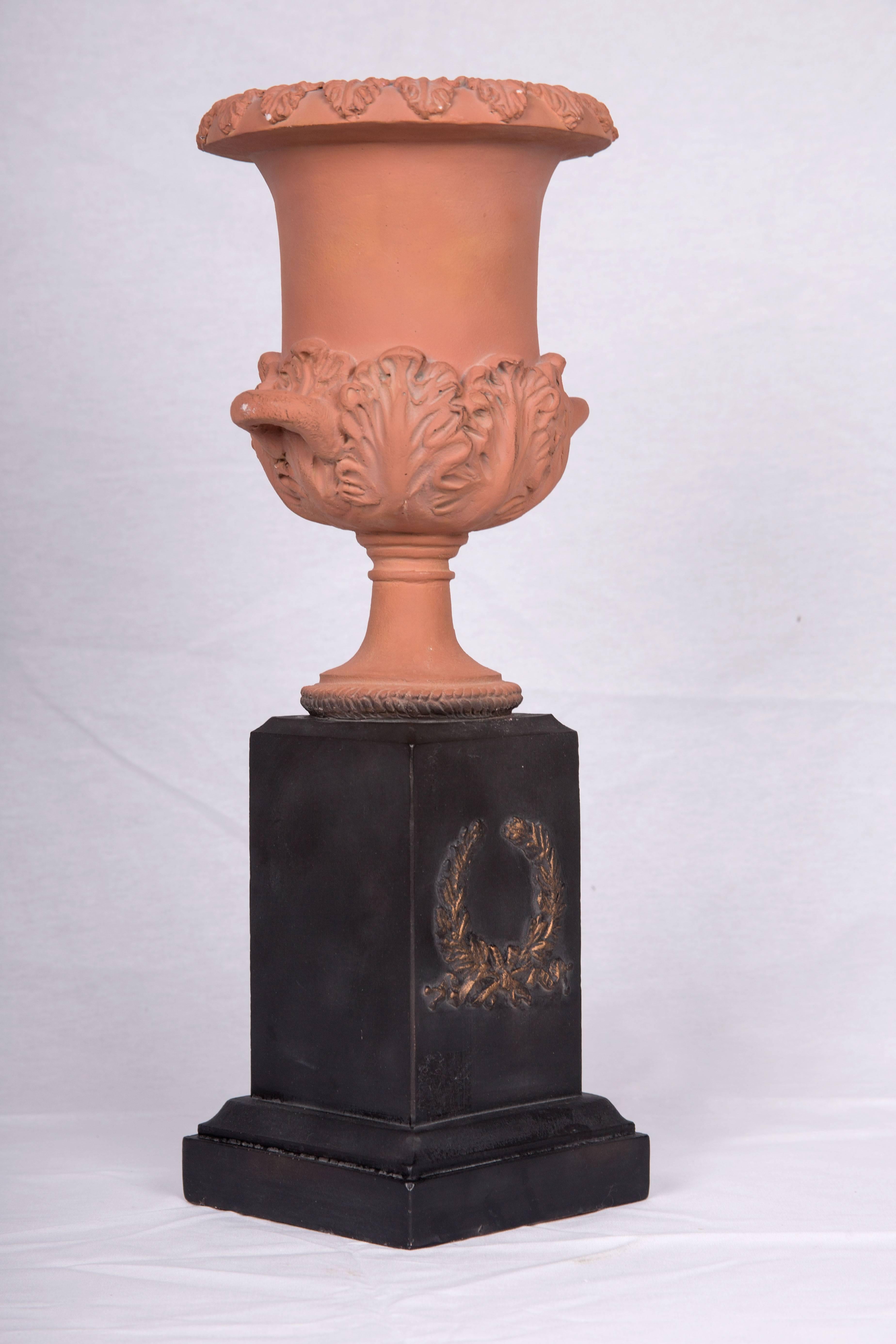 Pair of Neoclassical Terracotta Urns on Decorated Plinths In Good Condition In WEST PALM BEACH, FL