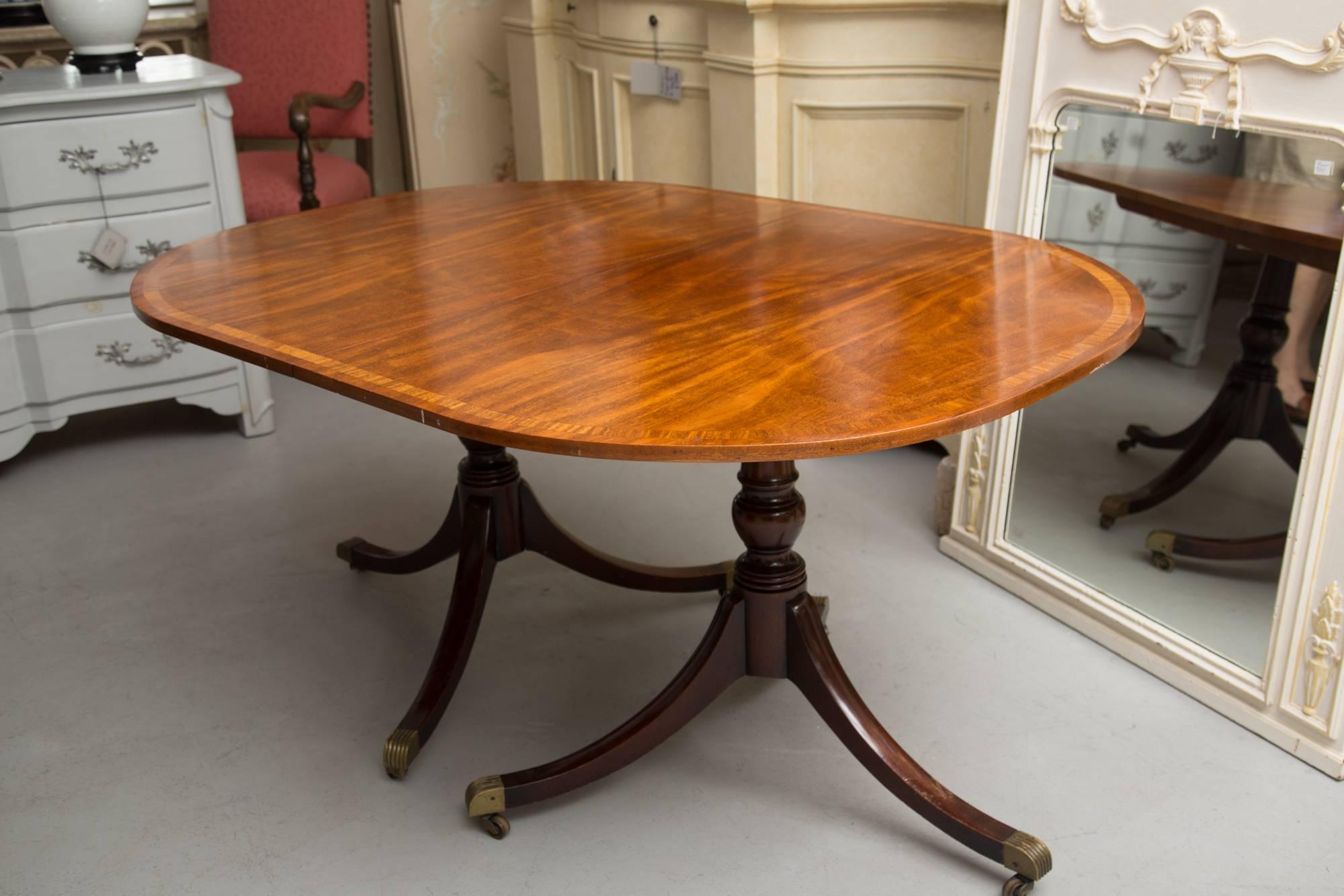 20th Century English George III Style Mahogany Twin Pedestal Mahogany Oval Dining Table