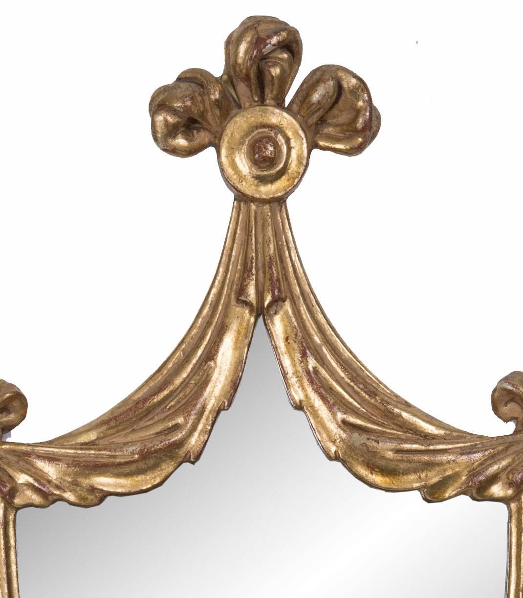 Adam Style Pair of Adams Style Carved Giltwood Mirrored Sconces For Sale