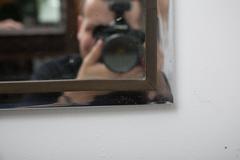 Polished Steel and Brass Arched Shaped Mirror