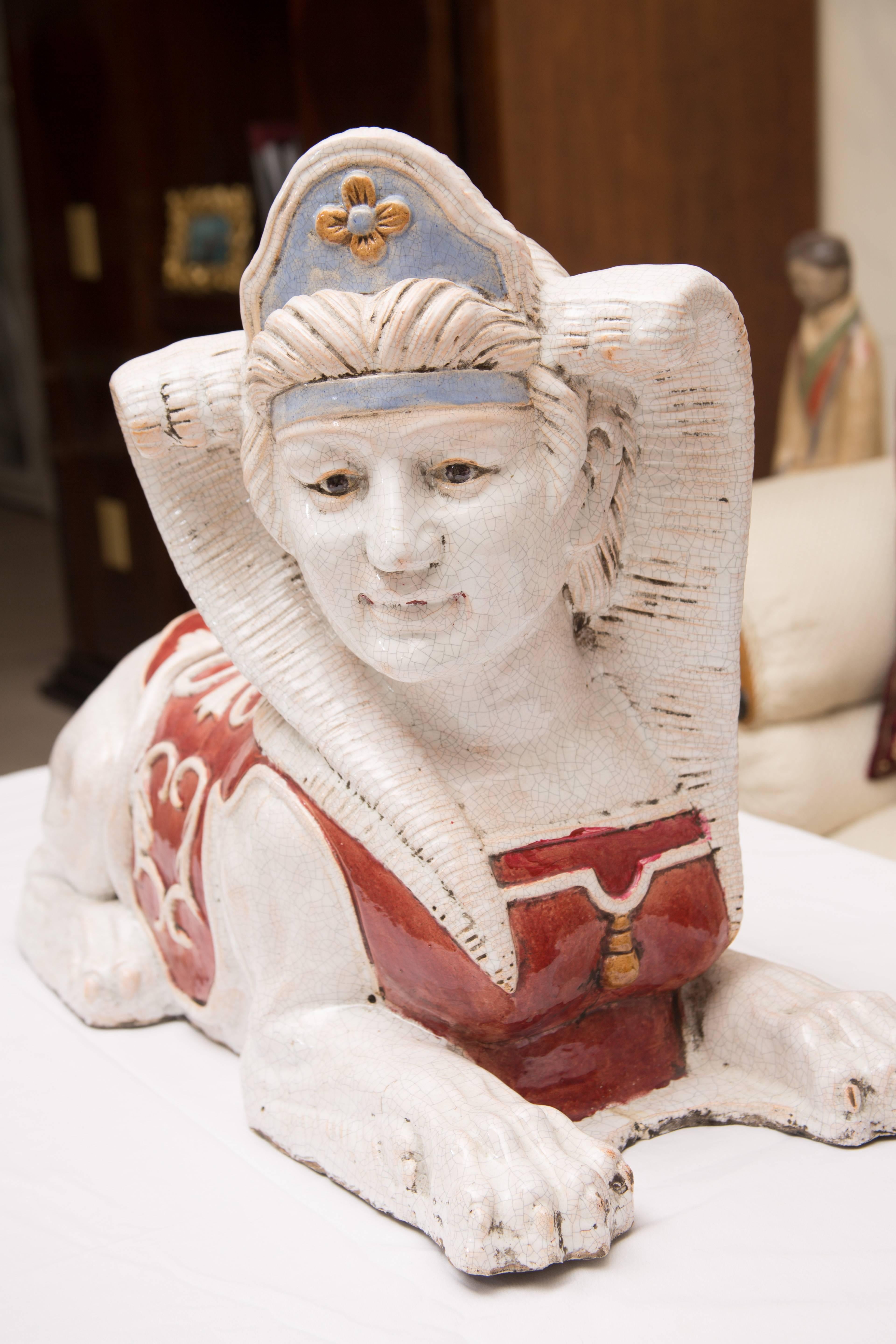 Fired Pair of Glazed Terra Cotta Sphinx Figures