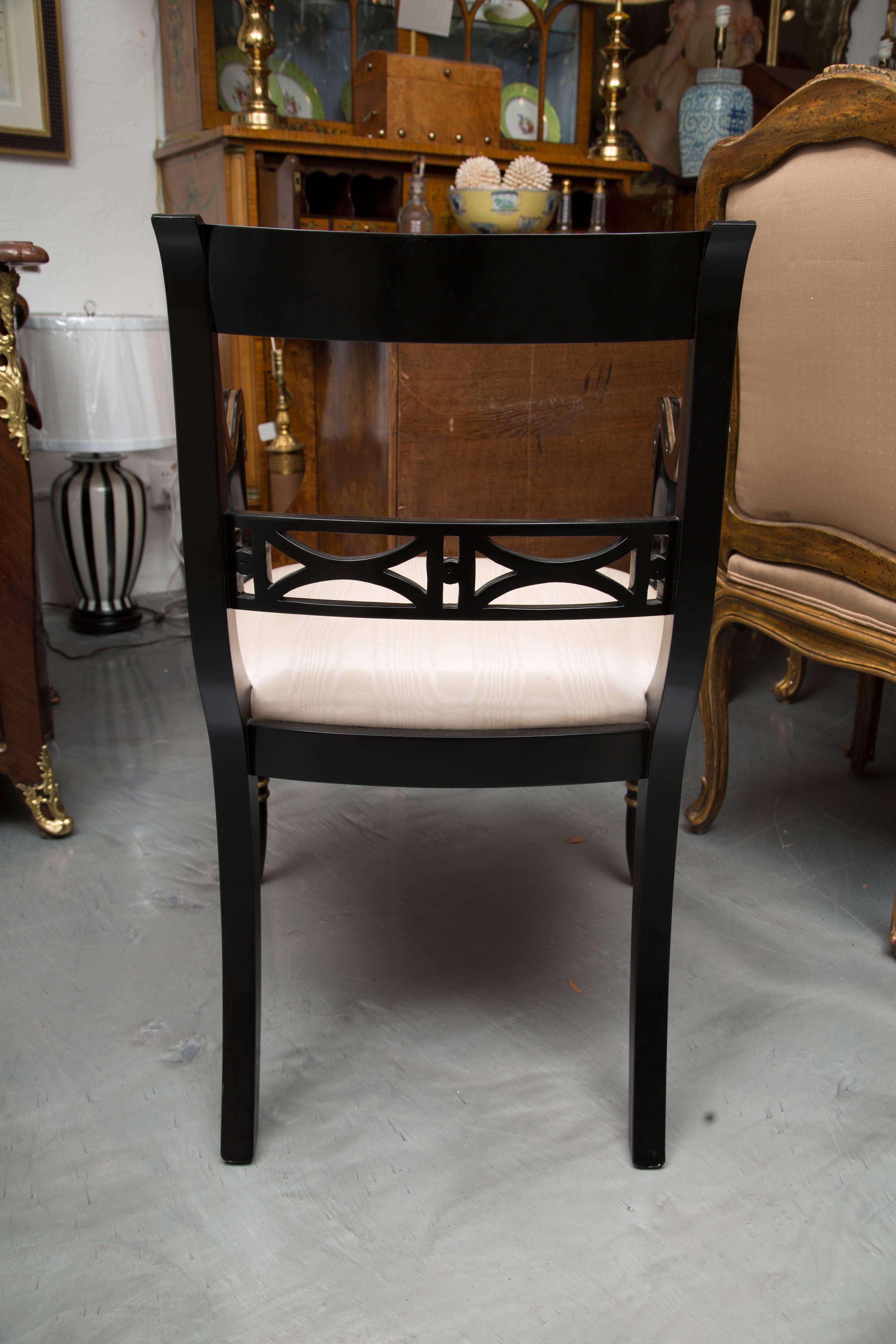 Wood Pair of Regency Style Ebonized and Parcel Gilt Armchairs
