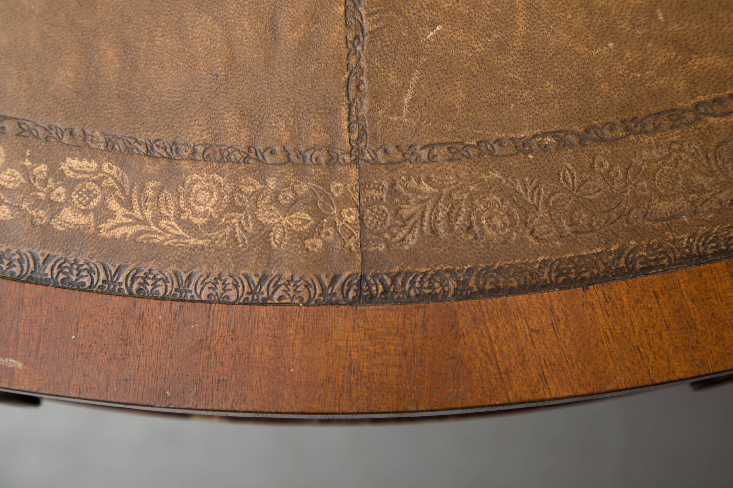 Embossed English Mahogany Drum Table with Leather Inset