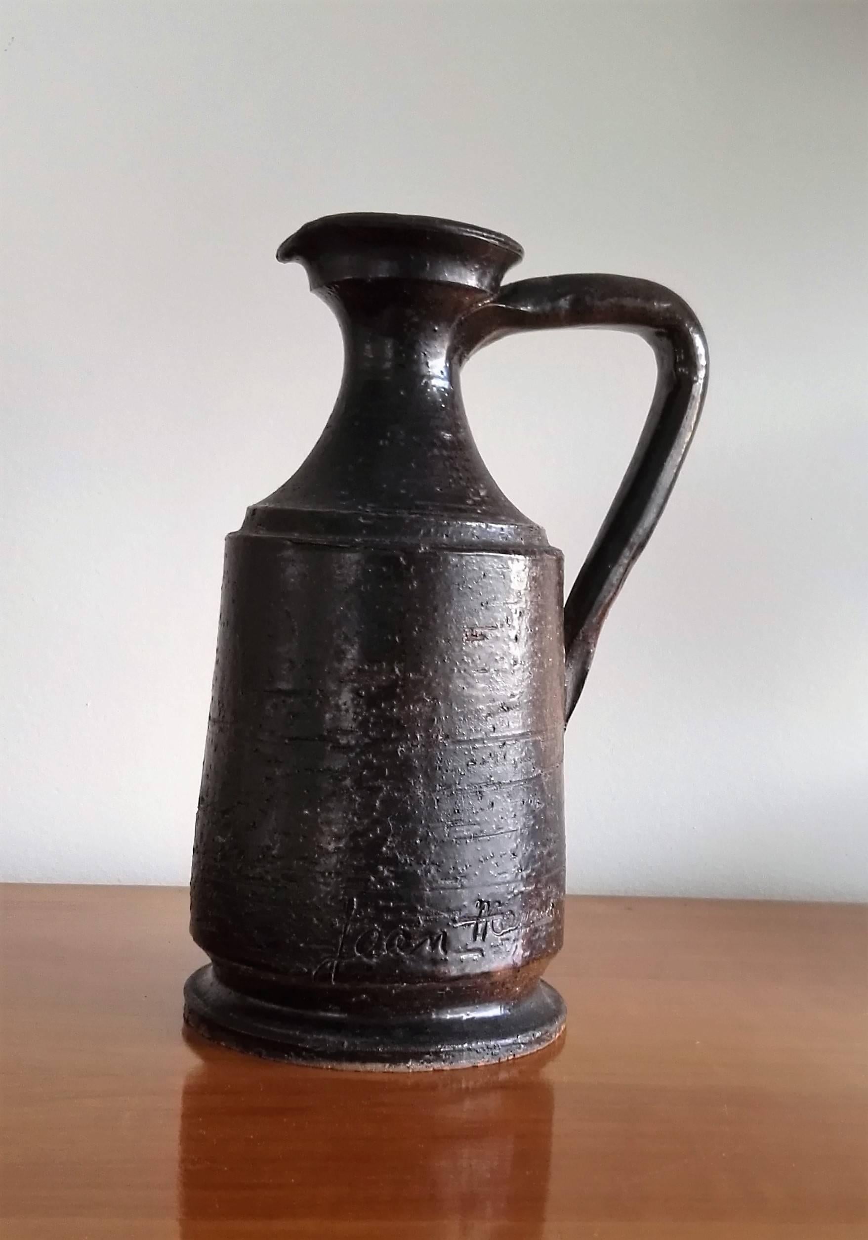 Black coated ceramic vase or pitcher elegant vase by French actor and Jean Cocteau's partner Jean Marais.
Very good vintage condition.
This item will ship from France.
Price does not include handling, shipping and possible customs related