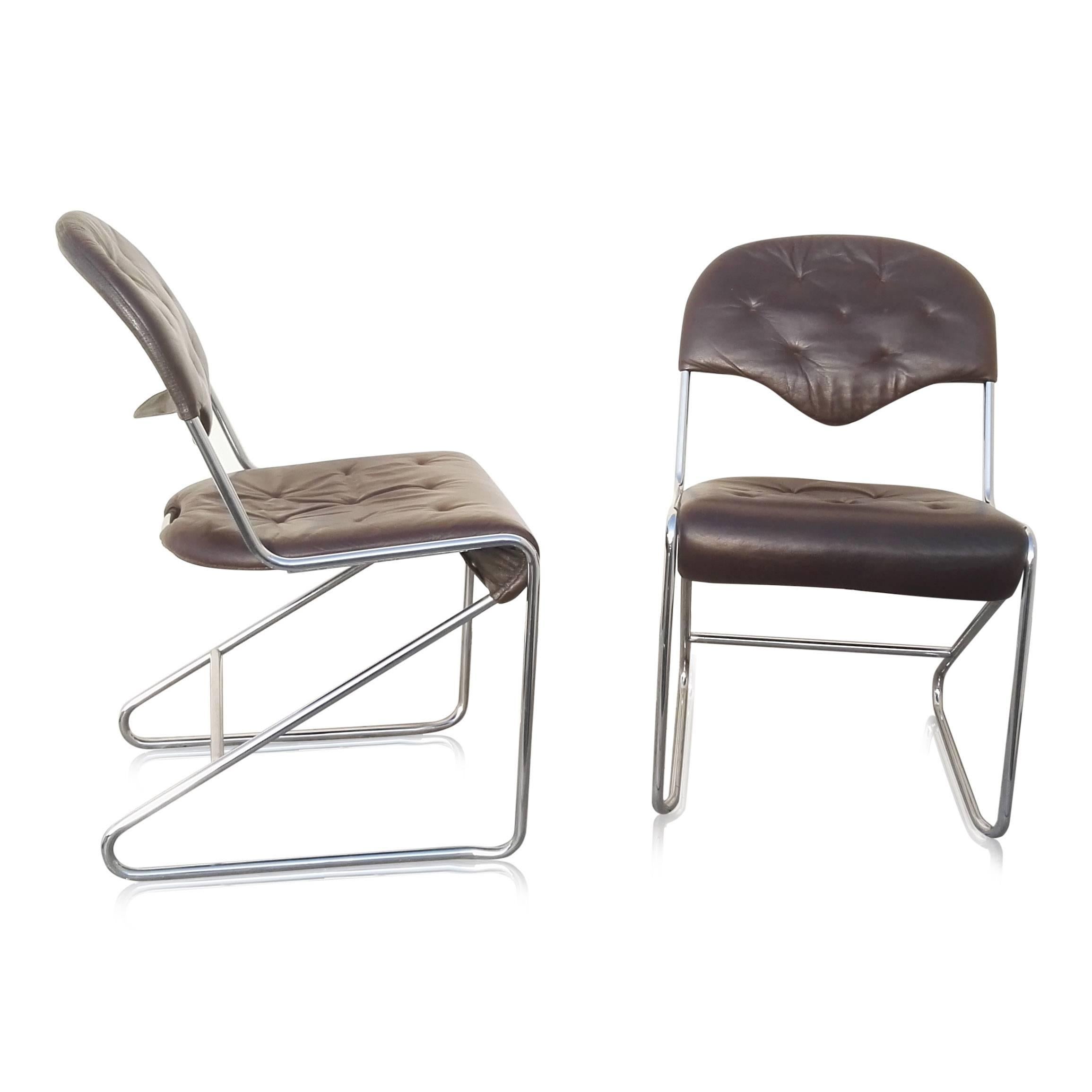 In the style of Tucroma chairs by Guido Faleschini
chrome in very good vintage condition
minor cracks on at the stitches level on the leather
this item will ship from France.
Price does not include handling, shipping and possible customs related