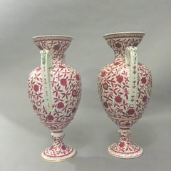 Pair of Bohemian Porcelain Amphoras with Gilt Rosewood Floral and Foliate Motifs