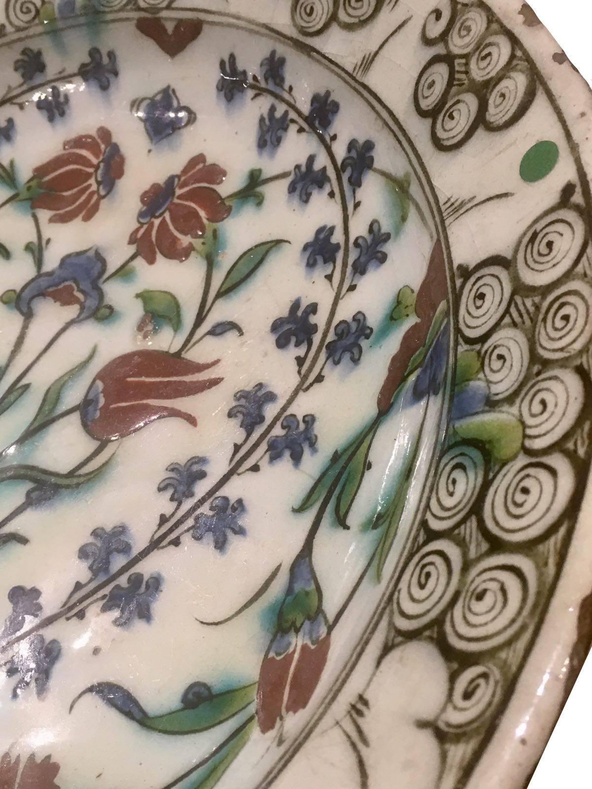Iznik was an established centre for the production of simple earthenware pottery with an underglaze decoration when, in the last quarter of the 15th century, craftsmen in the town began to manufacture high quality pottery with a fritware body