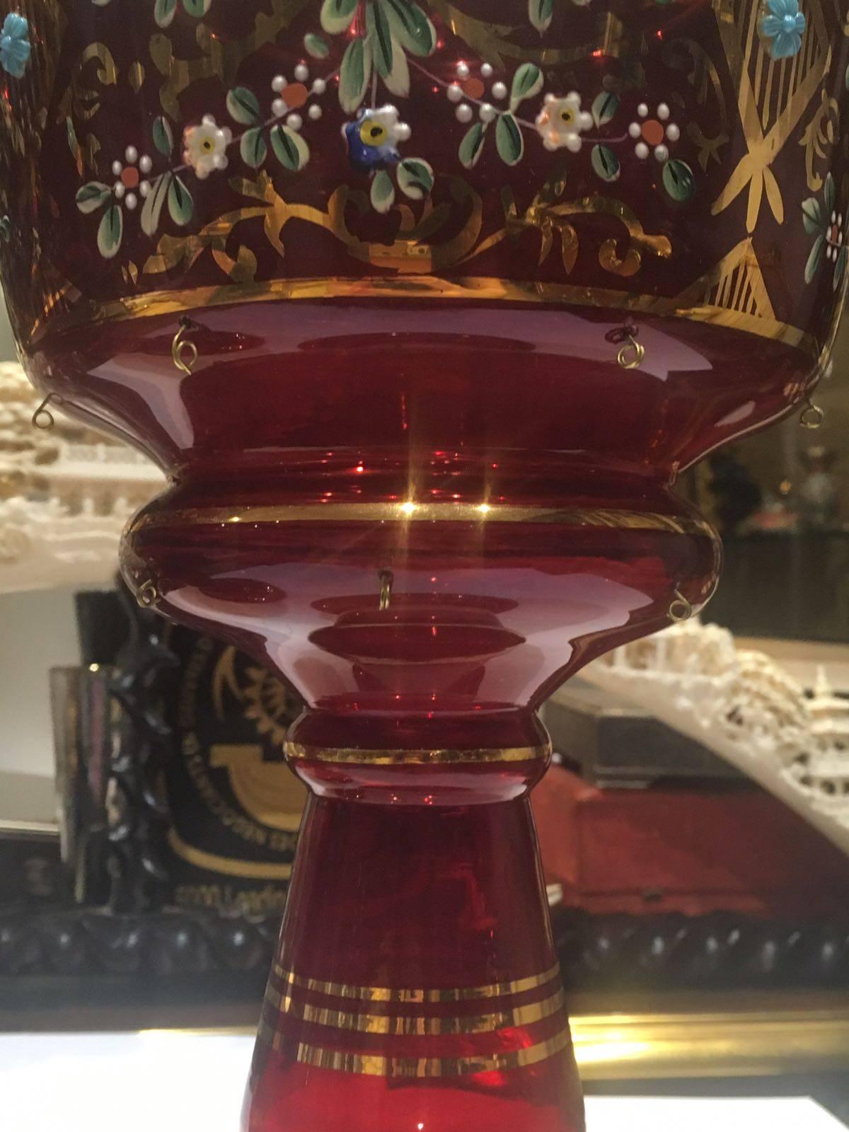 With floral and foliate enamelling.
 
Measures: D 18 cm
H 36.5 cm.