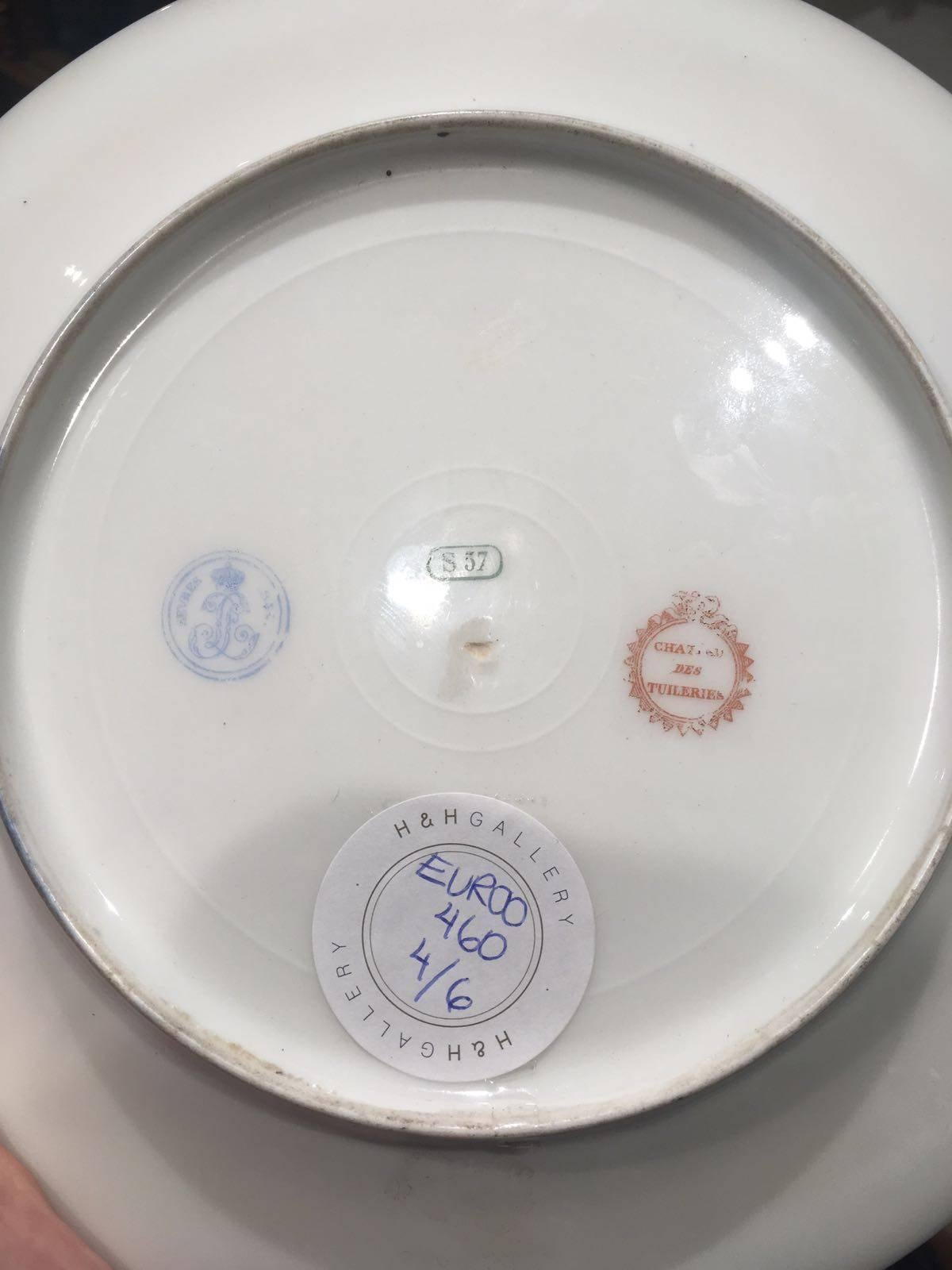 Each one is stamped underneath with: the blue Sevres Louis-Philippe mark dated 1844, the orange Chateau des Tuileries, along with a set number 'S37' in green, and handwritten (faded or mostly disappeared - visible under angled light) cursive writing