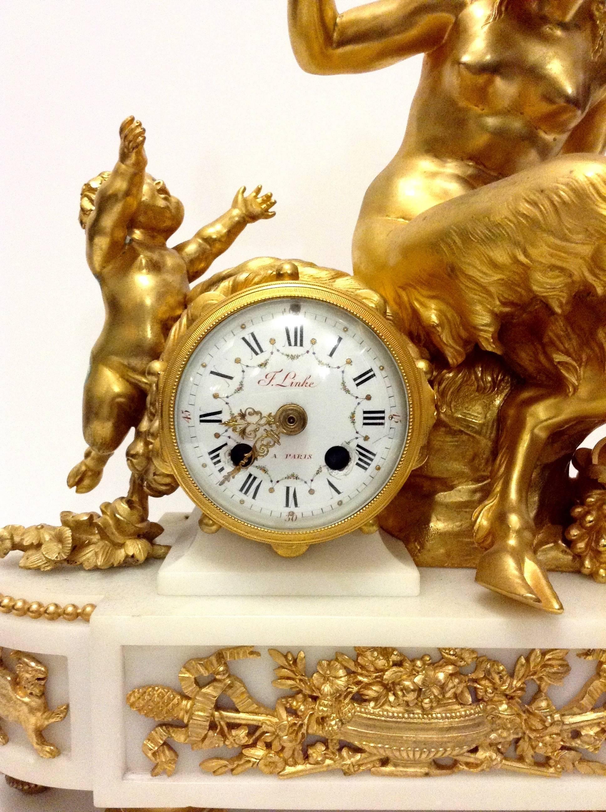 A François Linke clock made of gilt-bronze and white marble. This clock is an interesting piece as it is cast after a work by the famous French sculptor Clodion, also known as Claude Michel (1734-1814), who was known for his work in the Rococo
