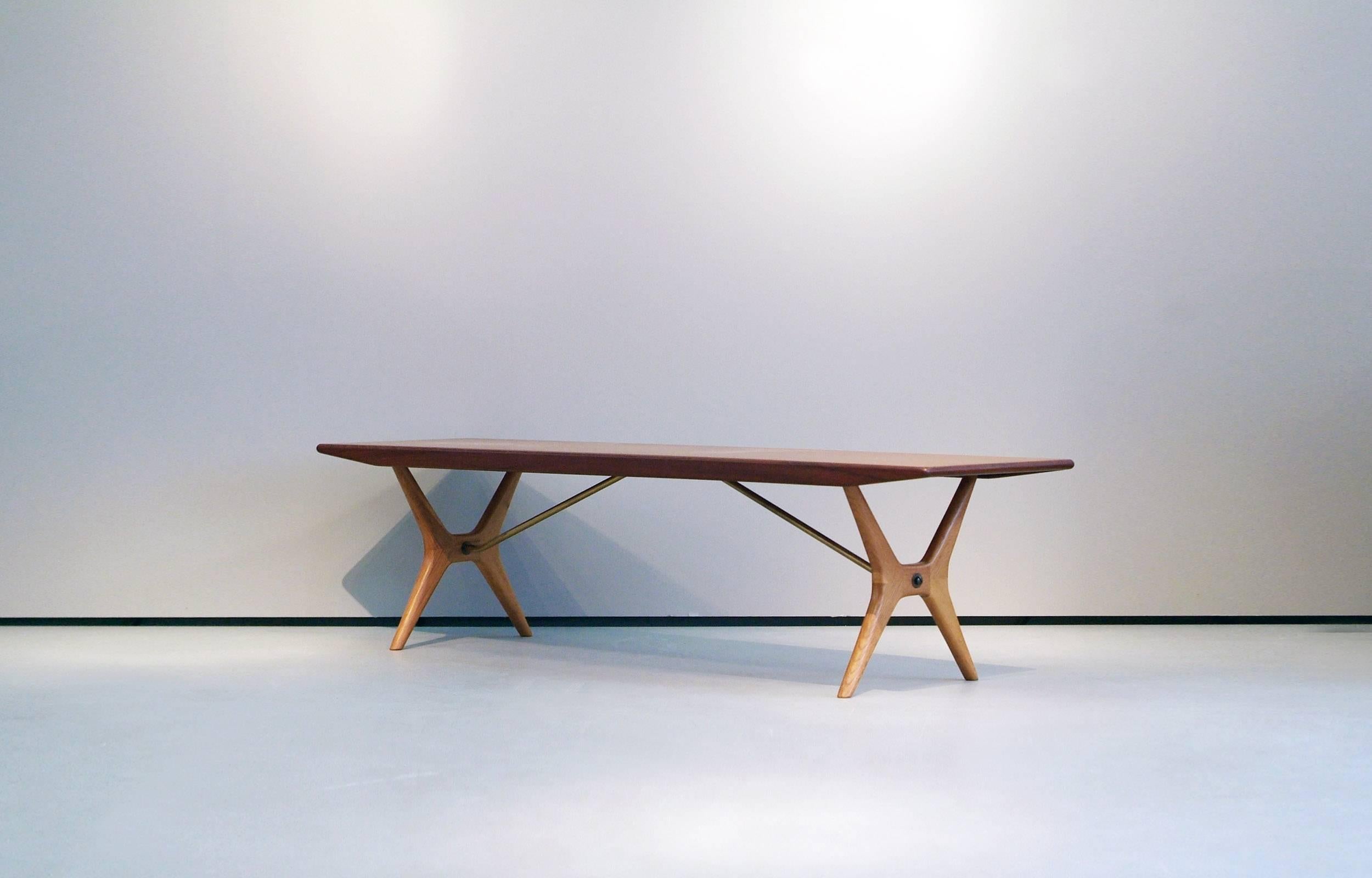 Rare Karl-Erik Ekselius bench made by JOC (J O Carlsson) in Sweden in the 1950s. Teak top and oak base with wonderful brass fittings.

Perfect, restored condition with minor wear consistent with age and use.
 