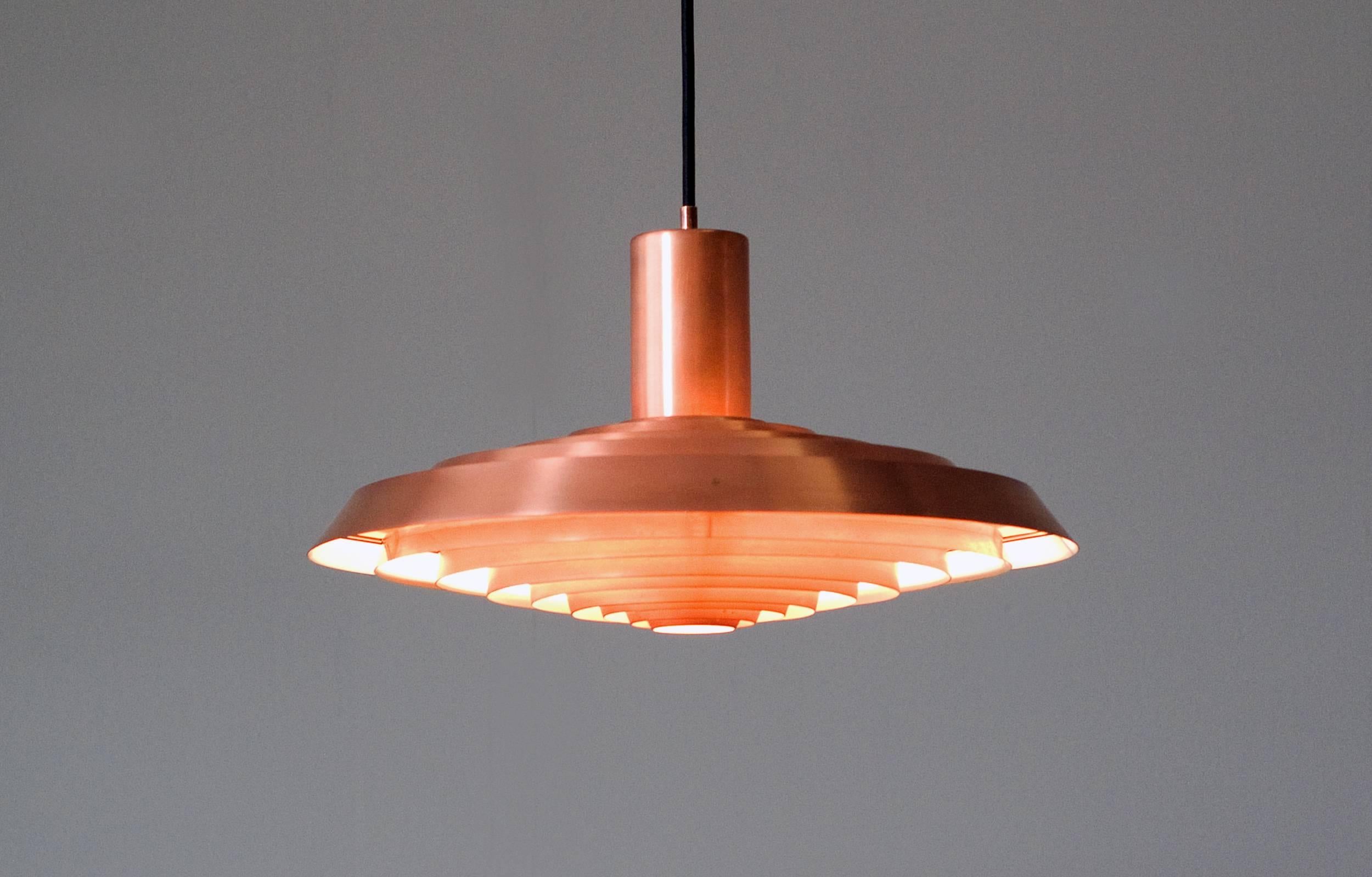 Wonderful Poul Henningsen for Louis Poulsen Pendant Light designed in 1958 for the restaurant Langeline in Copenhagen. 

Minimal wear consistent with age and use. Great vintage condition.

  