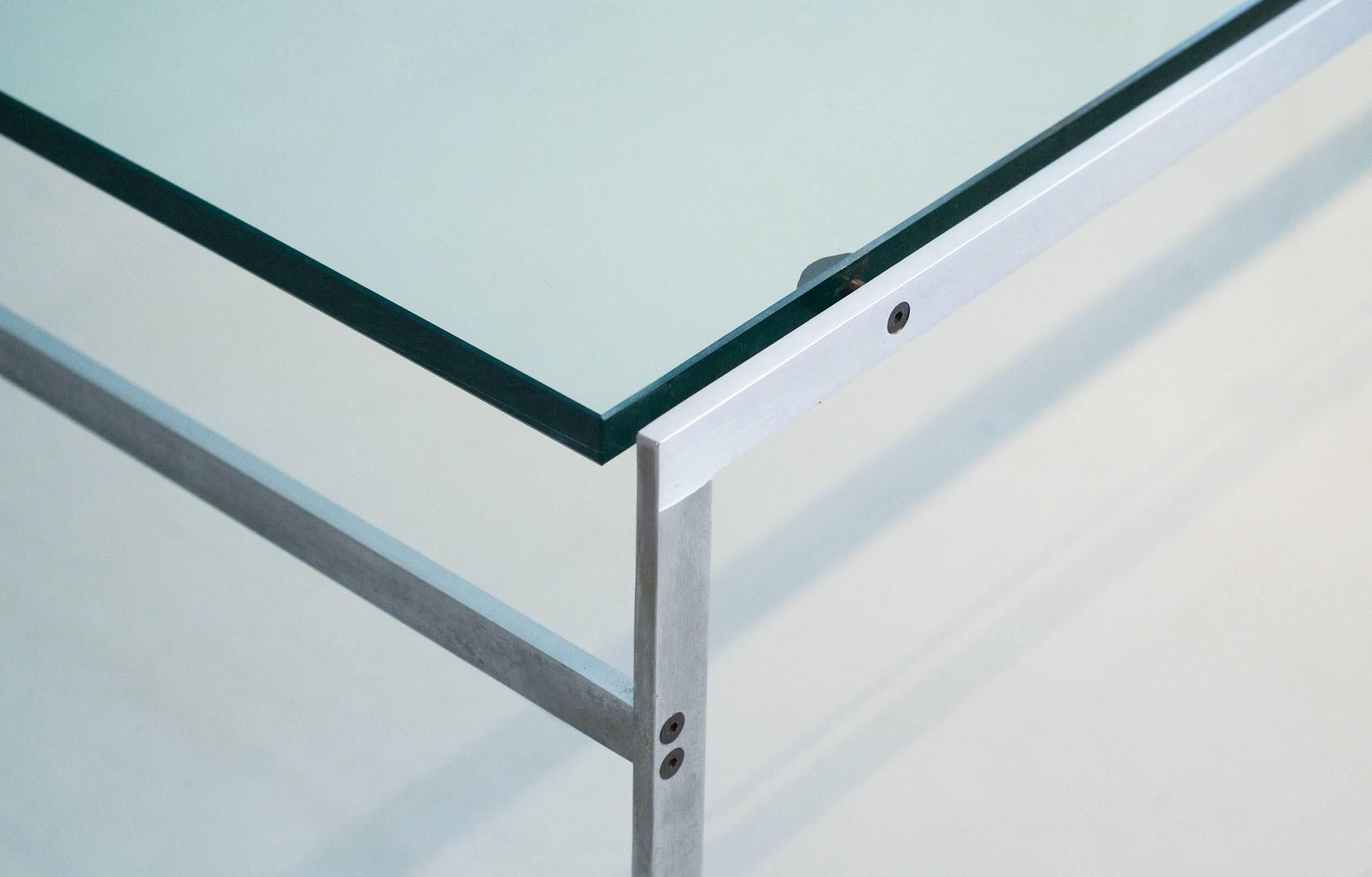 Great glass coffee table designed by Jørgen Kastholm & Preben Fabricius
in the 1960s and produced by Bo-Ex. Matte chromed flat steel and the original 2 cm glass top.
 