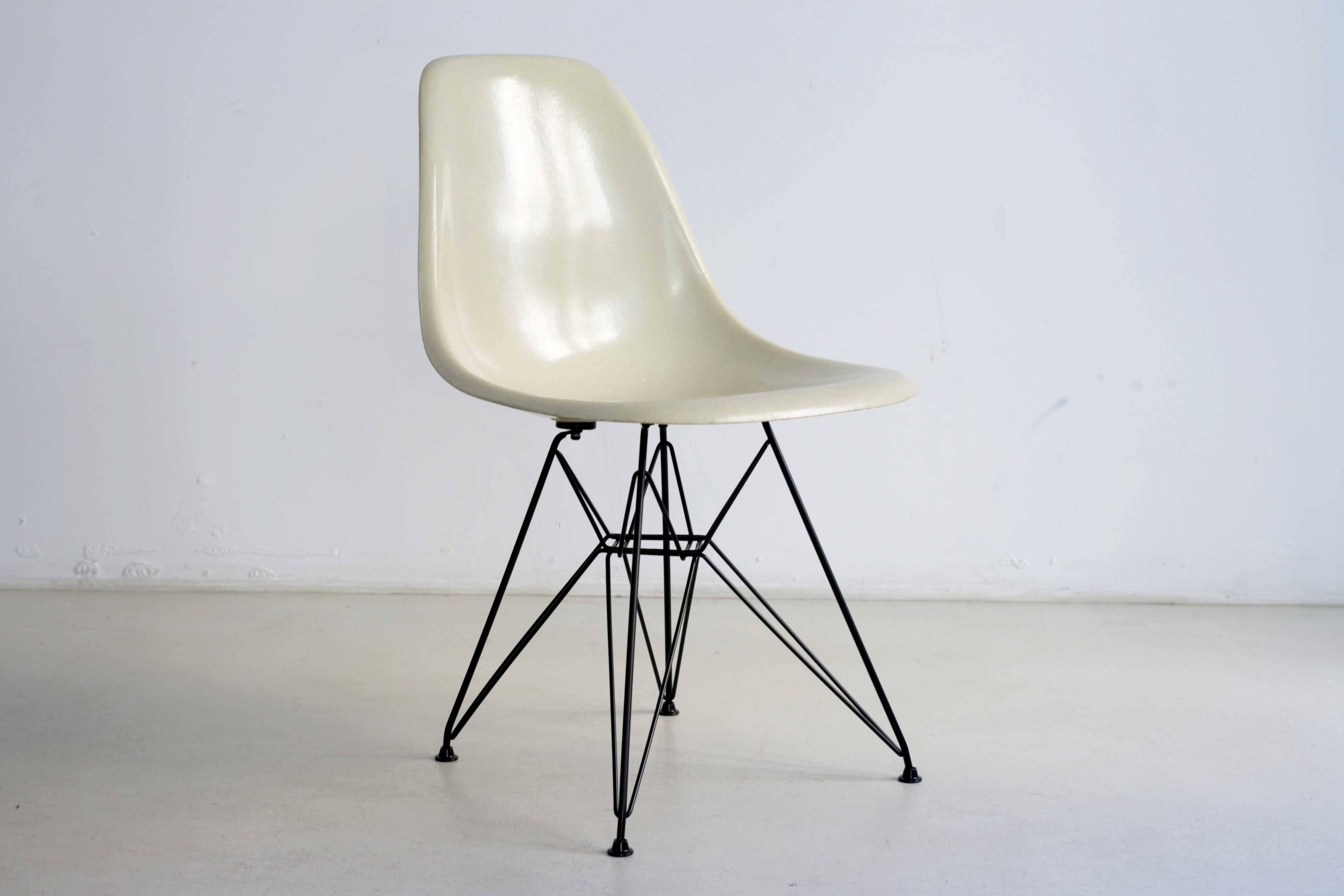 Set of four fiberglass chairs by Charles Eames for Herman Miller. Bases from Modern Conscience, recommended by Herman Miller for the Restauration and preservation of vintage Eames seating.