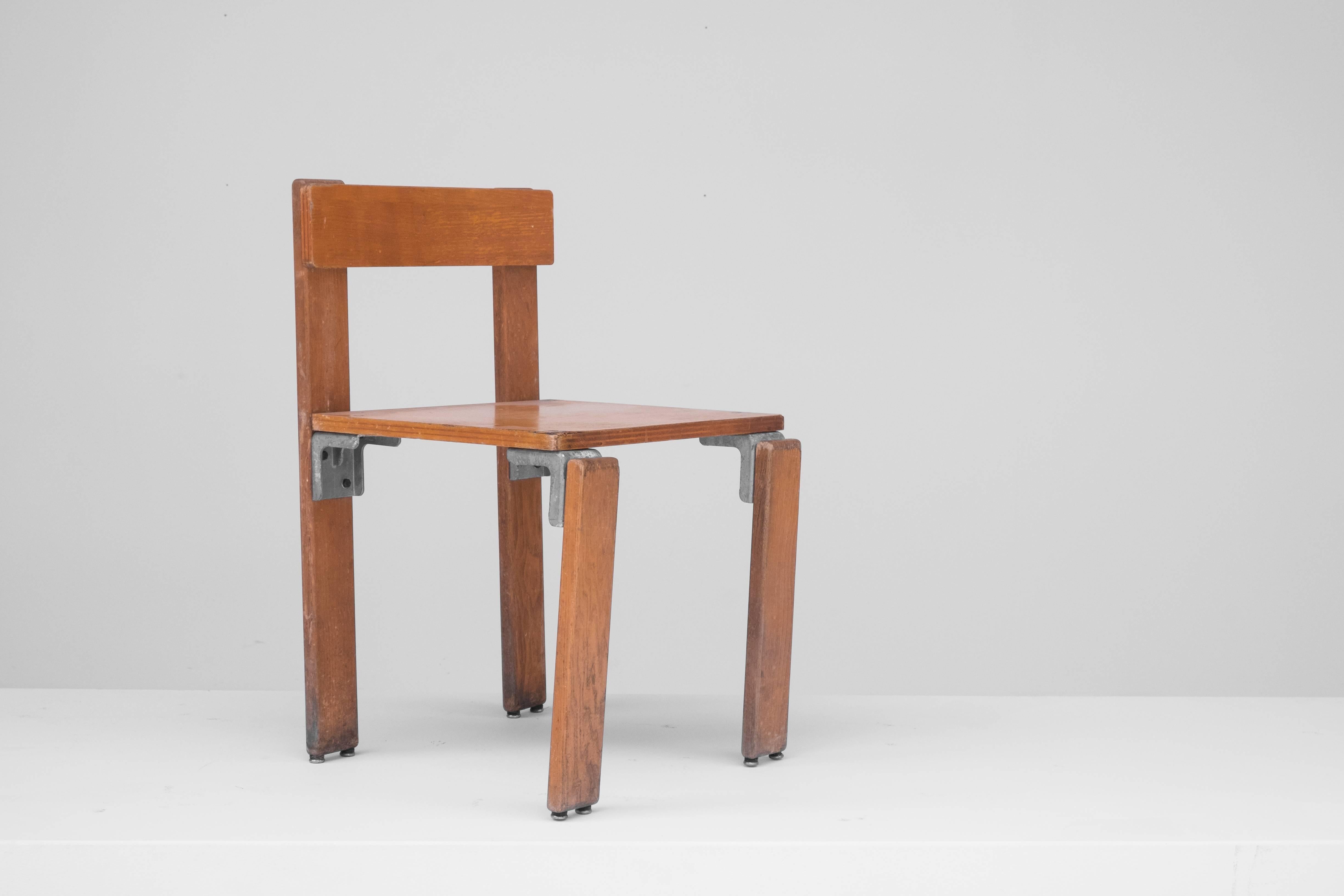 Stratified wooden chair by Greek architect Georges Candilis & Anja Blomstedt.
These chairs were designed in the early 1970s for Holiday resort 'Les Carrats' in Port Leucate.
 