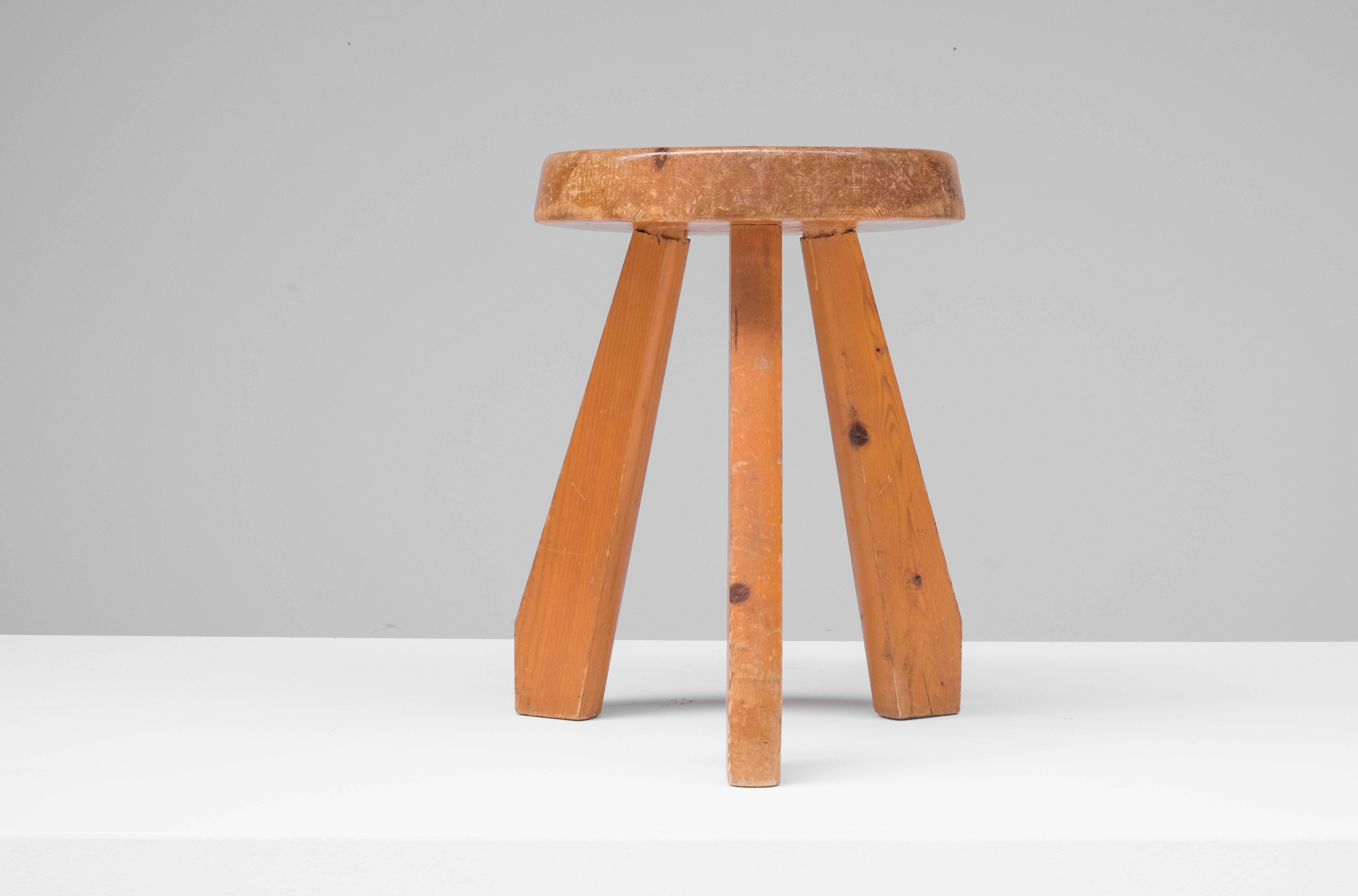 Charlotte Perriand stool, for Les Arcs, model 'Sandoz', French, 1960s.
The stool is made out of pine and has a nice patina.
  