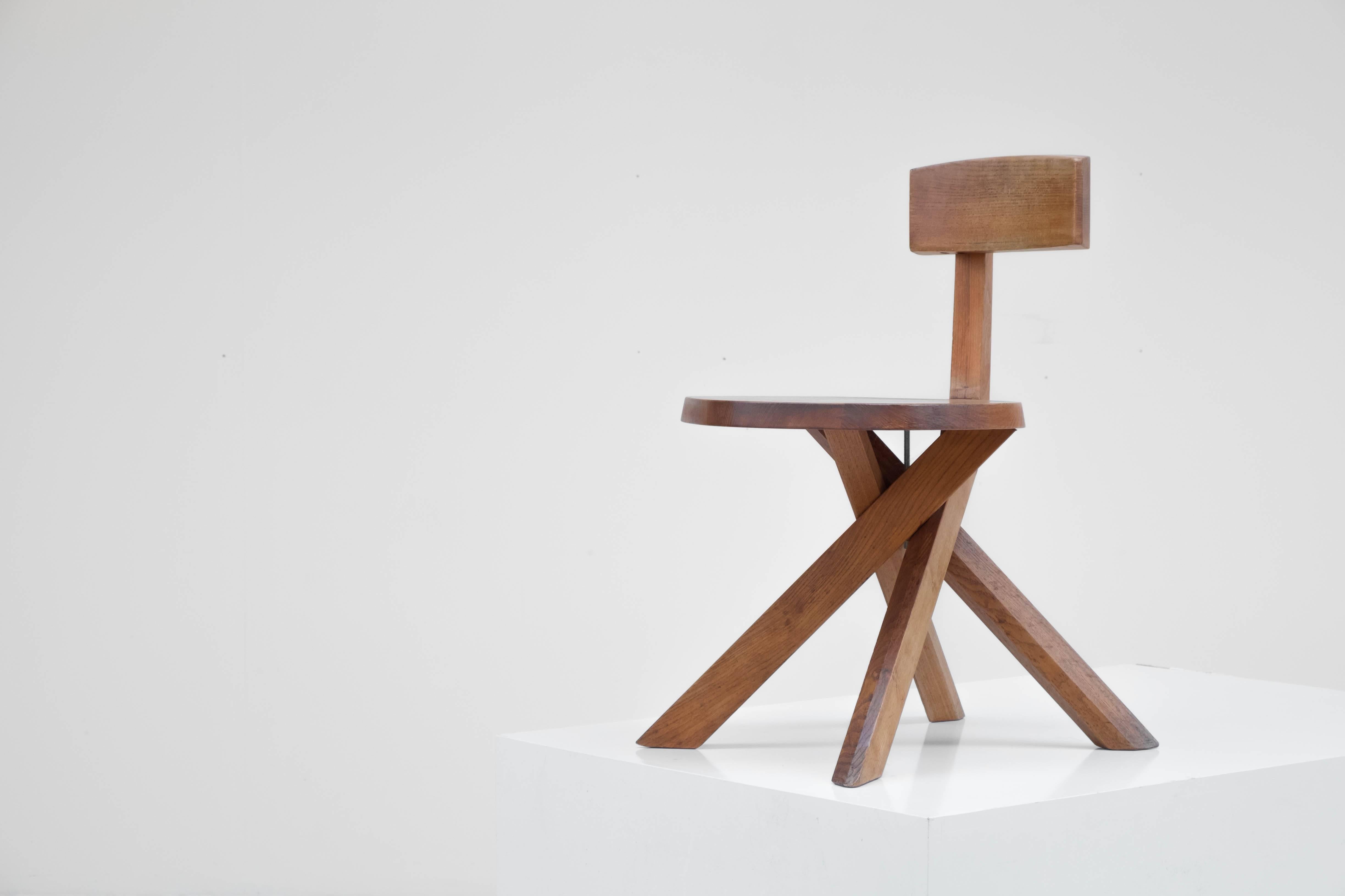 The S34 chair in solid elm by French designer Pierre Chapo, produced in the late seventies by Seltz.


 