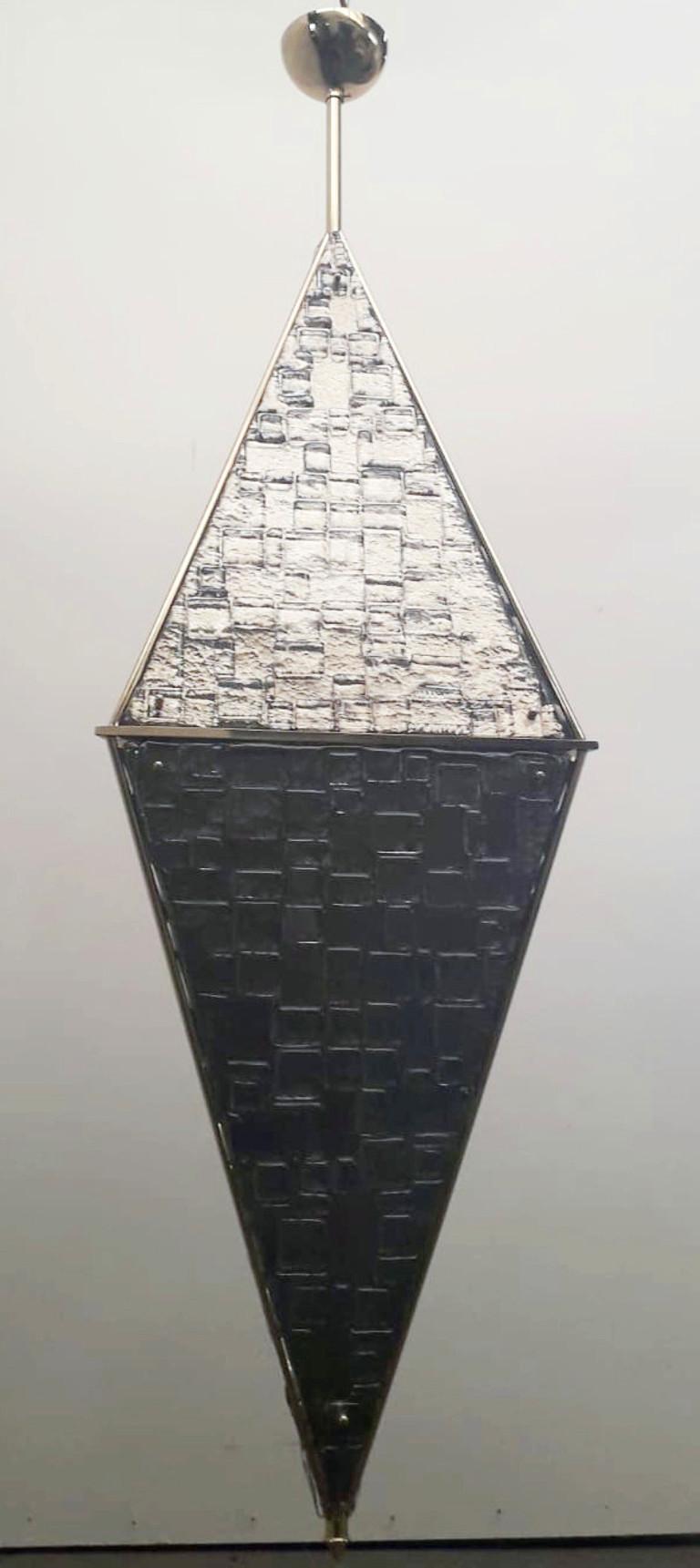 Limited edition Italian lantern with silvered triangular textured Murano glass, mounted on polished brass metal finish frame / Exclusively designed by Gianluca Fontana for Fabio Ltd / Made in Italy
12 lights / E12 or E14 type / max 40W each
Total