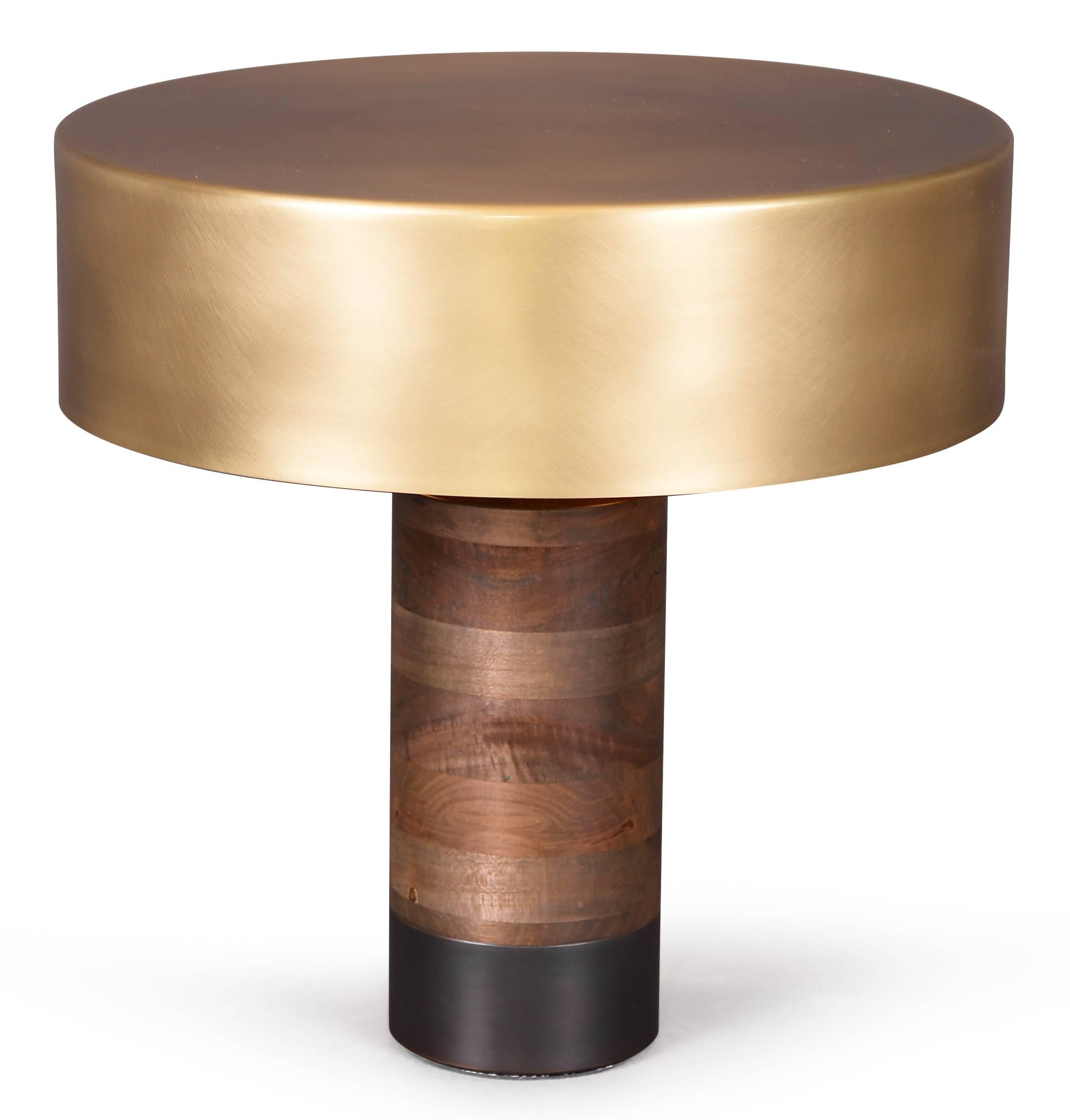 The sleek and striking Gotham lamp features oxidized ambrosia maple and bronze.

Dimensions as shown in images: D 14 in. / H 14 in.

Other Standard Size: 
Dimensions: D 14 in. / H 20 in.

