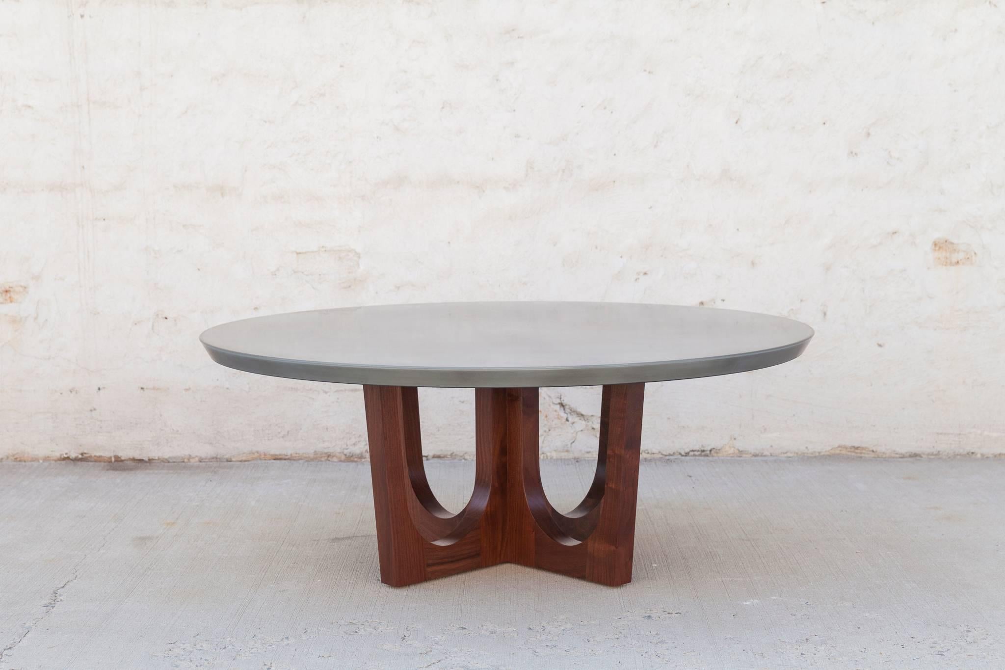 The elegant Grand Pedestal coffee table features a beveled zinc encased in resin tabletop and a curved lolita walnut base. The smooth and durable resin top is non-porous so it does not stain and there are no moisture issues.

Standard size options-