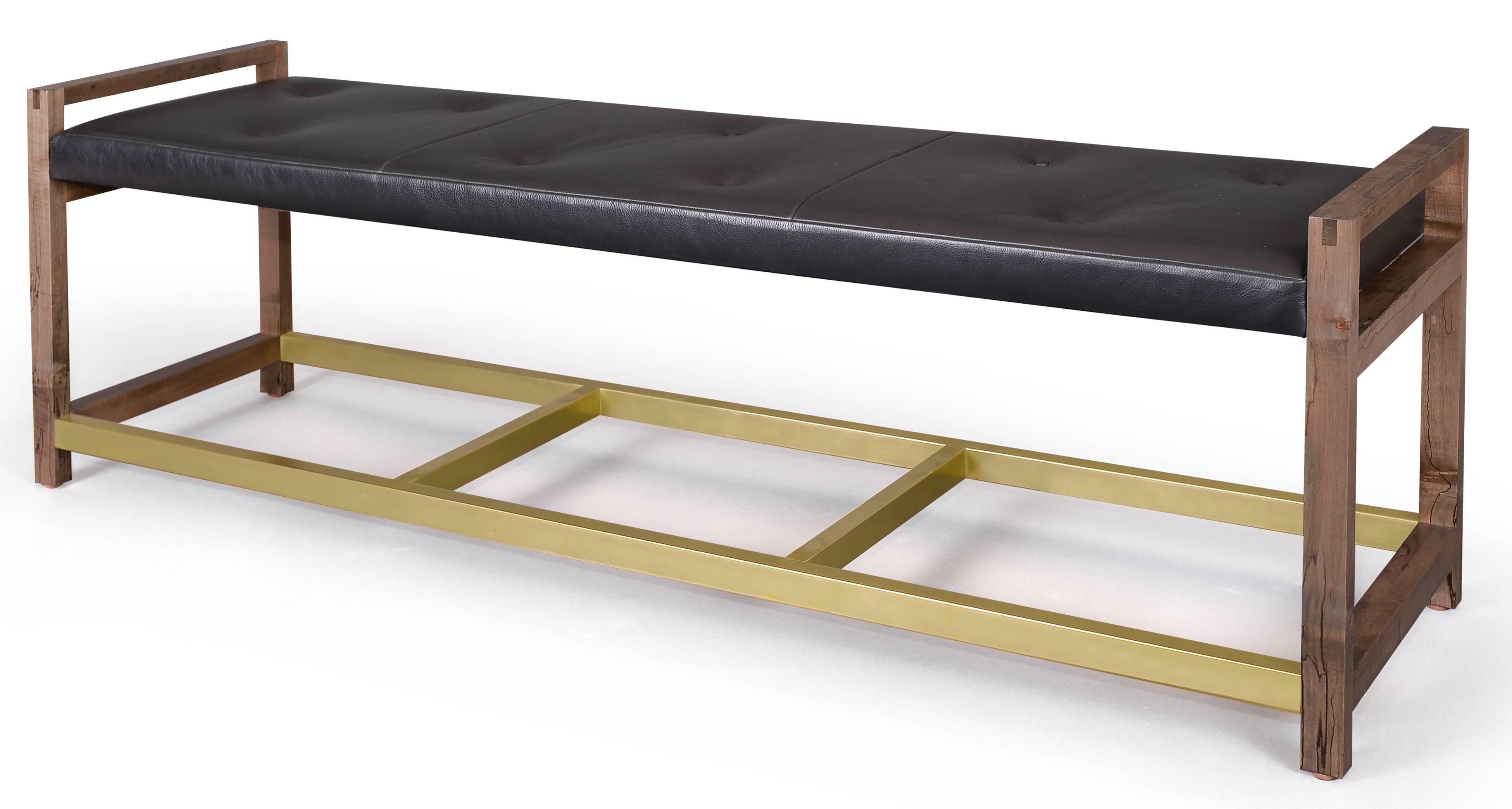 The timeless design of the Gotham bench features a black leather cushion on an oxidized Ambrosia maple and bronze base. Cushion material can be COM. 

One available in-stock:
L 65 in. / D 16 in. / H 22 in.

Standard size options - 10-12 week