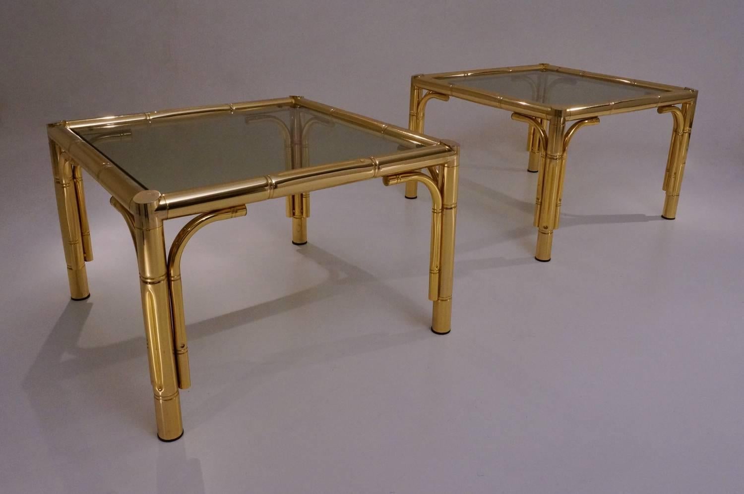 Maison Baguès tables (attributed) a pair in brass bamboo effect frames with glass tops, 1970s, circa France.

These tables have been thoroughly cleaned respecting the original aged patina and are ready to use.

This Modernist pair of vintage