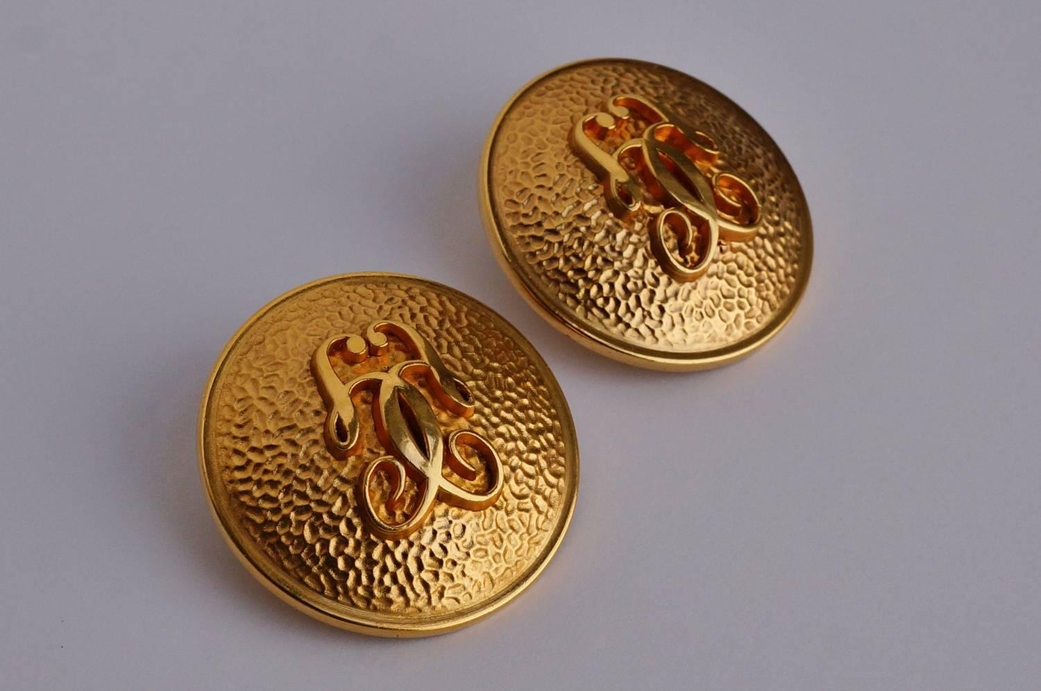 Guerlain earrings gold-plated gilt, circa 1980s, French. With their shield-like form these vintage earrings are characteristic 1980s statement jewelry. The neoclassical design is both playful but also timeless, making these earrings Classic and easy