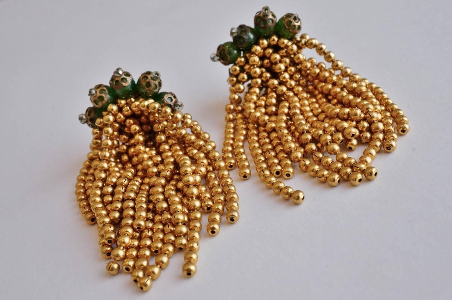 Paris House London jewelry, pair of gold plated gilt earrings, 1950s, England. Inspired by Japanese wisteria, this unique pair of vintage earrings capture the post war fascination with the exotic. From a series of 5 milky green beads dangle a
